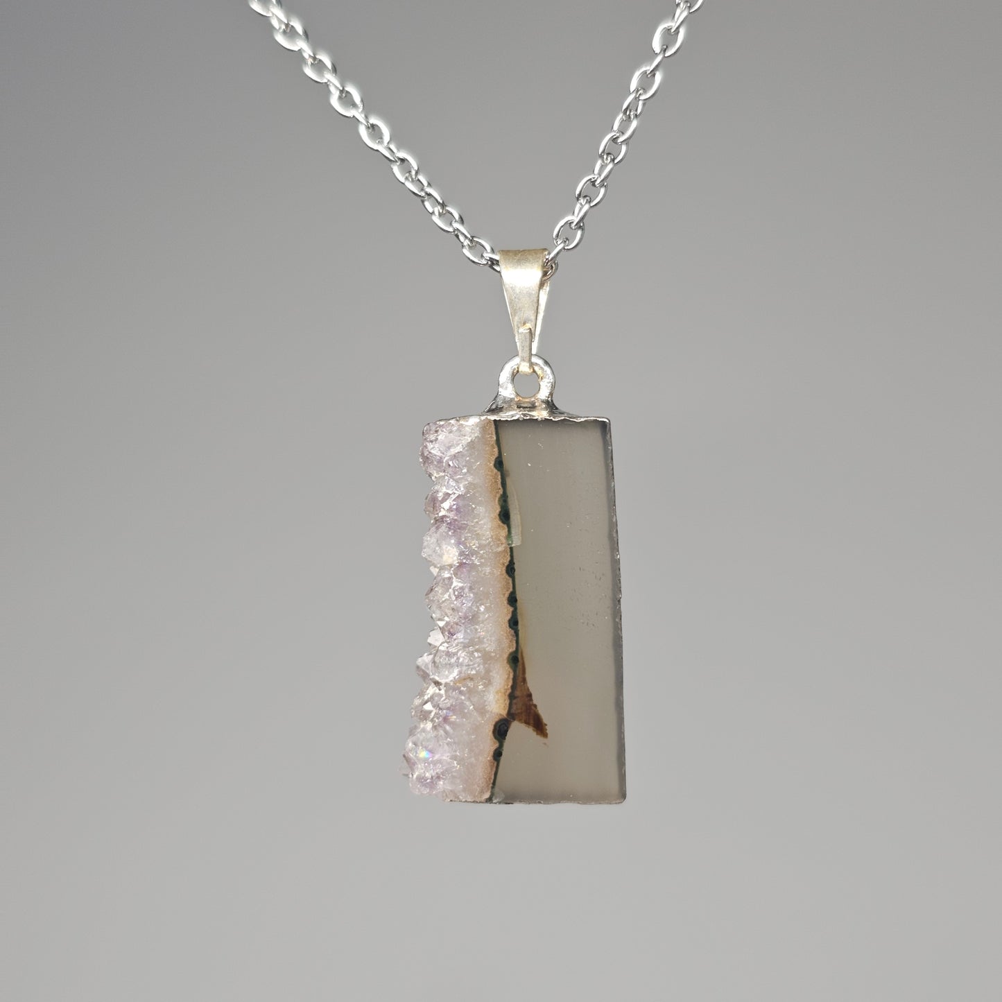 Amethyst Stalactite Slice Pendant hanging on a 45cm stainless steel chain