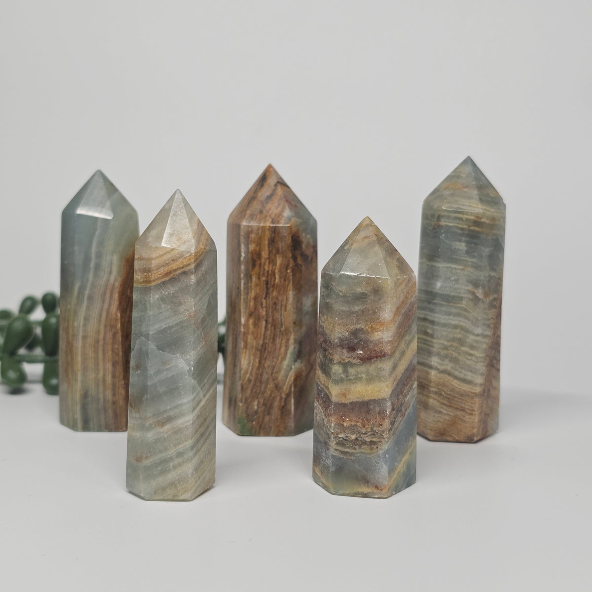 Banded Blue Onyx towers displayed in an upright position