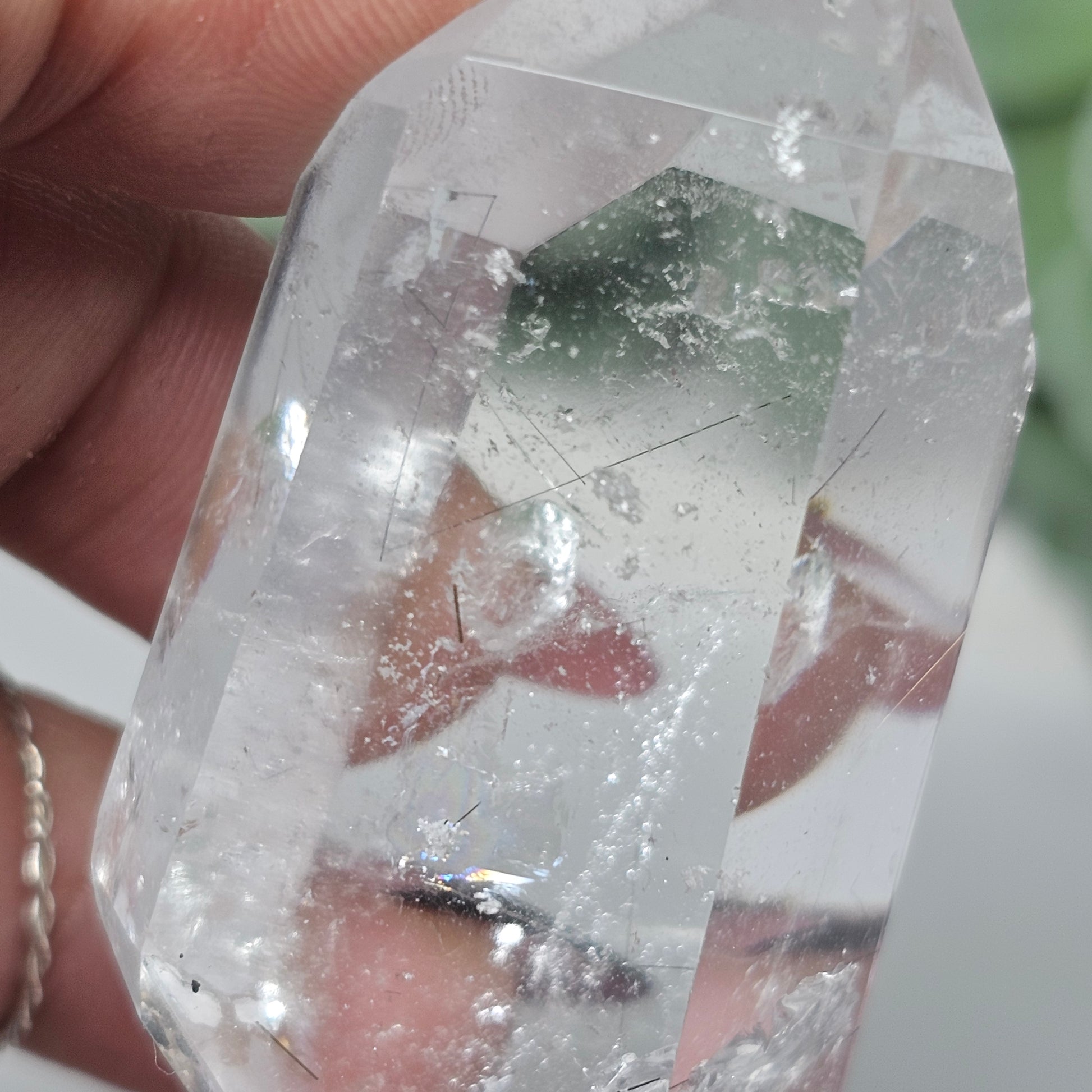Close-up view of Black Rutile Quartz showing fine sparse rutile threads and the natural key formation within the crystal.Rutile Quartz Slanted Tower