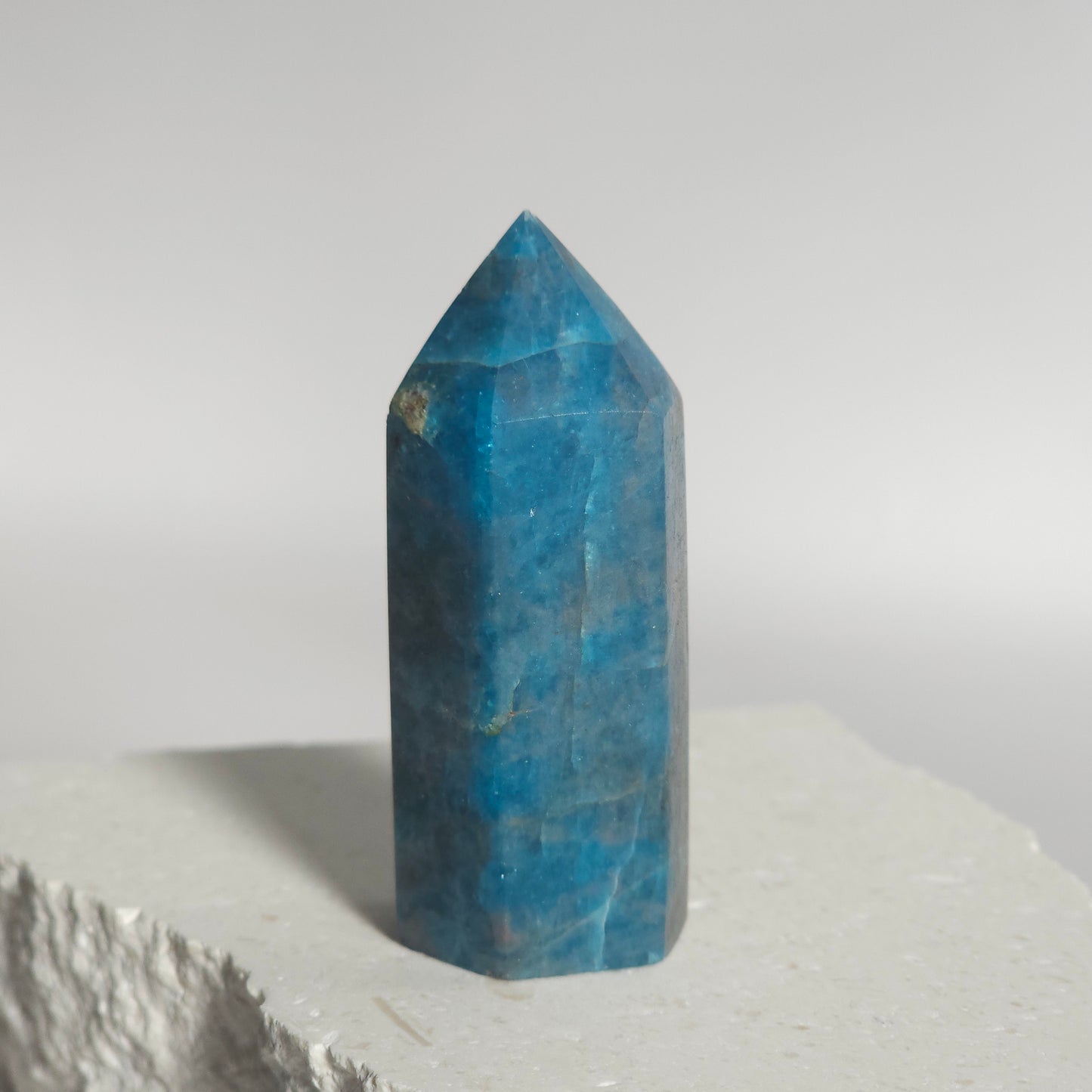 Blue Apatite tower showing vibrant blue colour and natural variation.