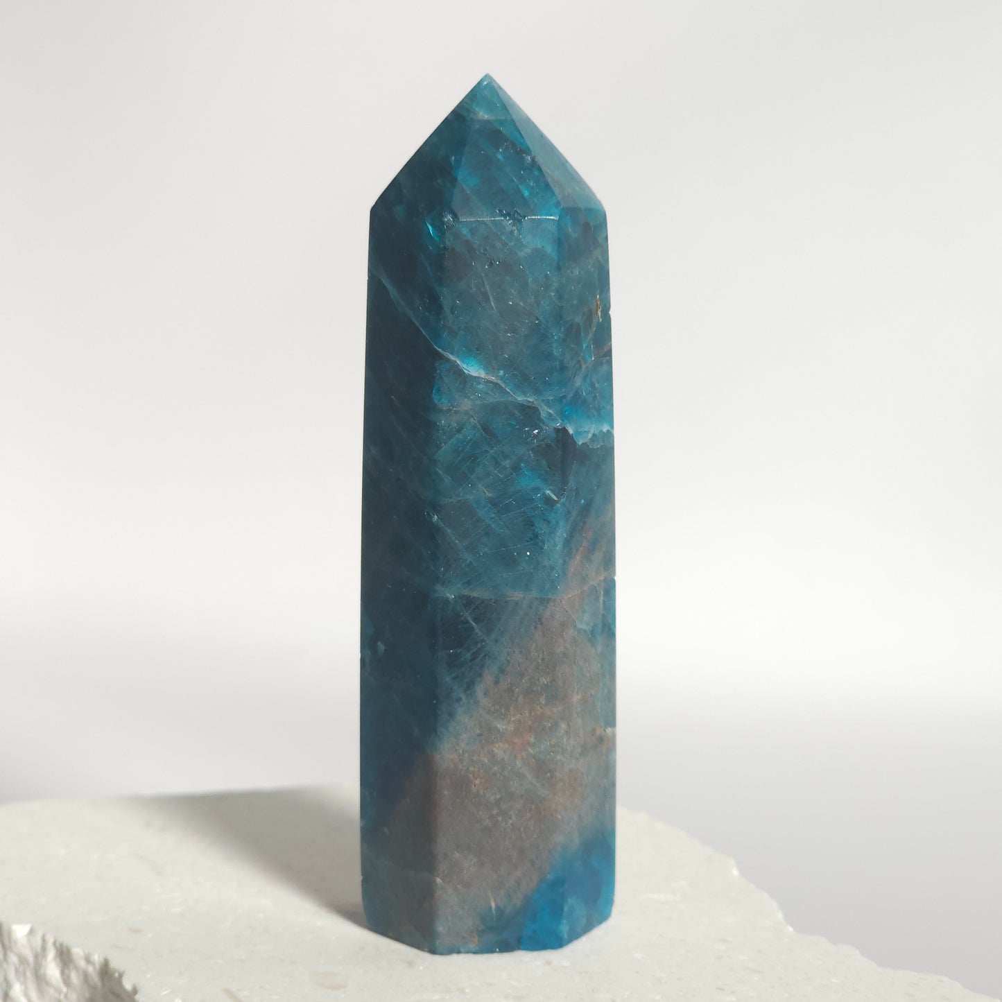 Blue Apatite tower showing vibrant blue colour and natural variation.