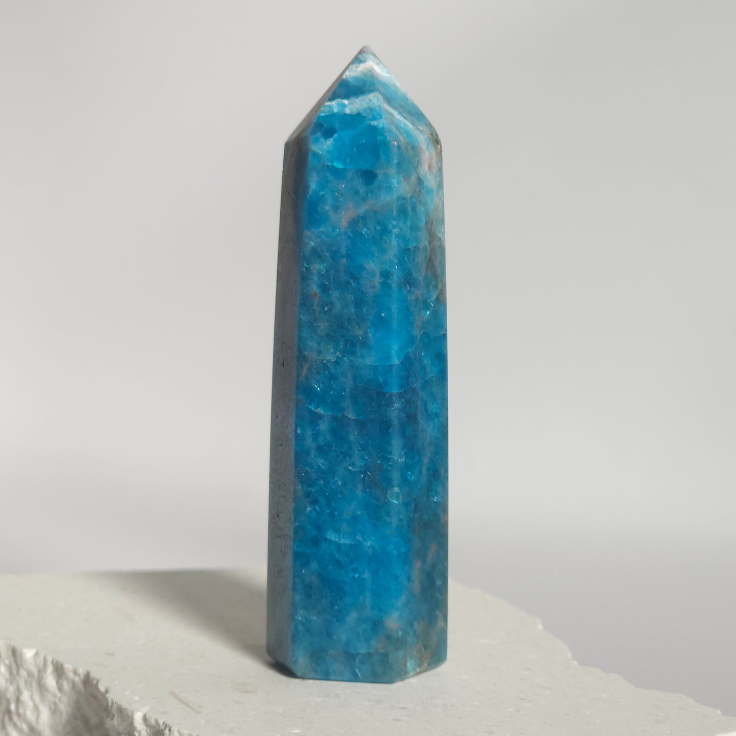 Blue Apatite tower showing vibrant blue colour and natural variation.
