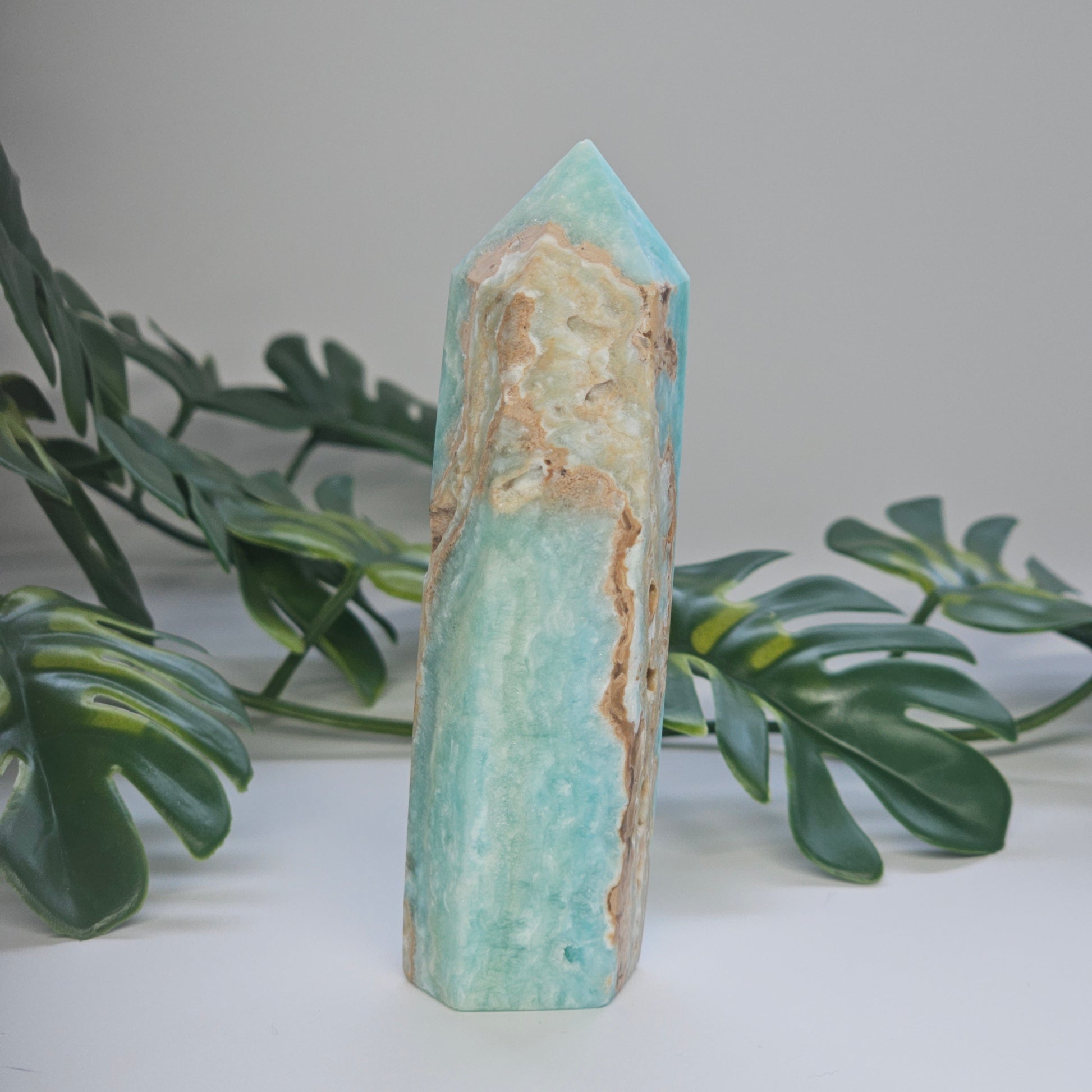 Angled view of Blue Aragonite tower highlighting colour variation and organic formation.