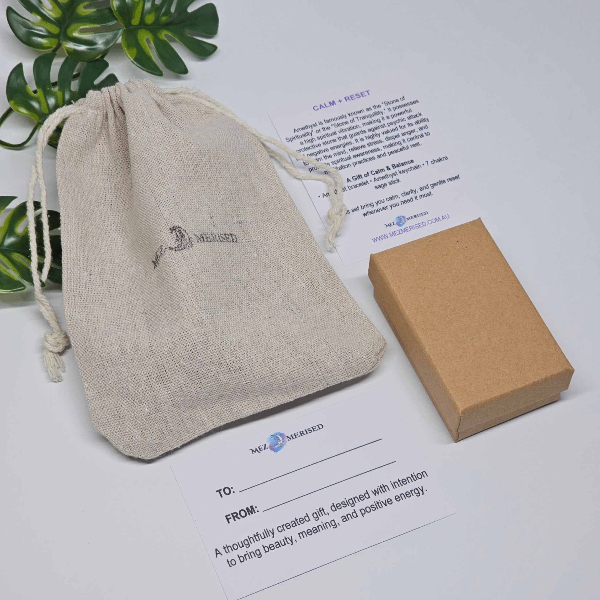 Calm & Reset crystal gift box fully packed with items inside, including info card and to & from gift card, ready for gifting.