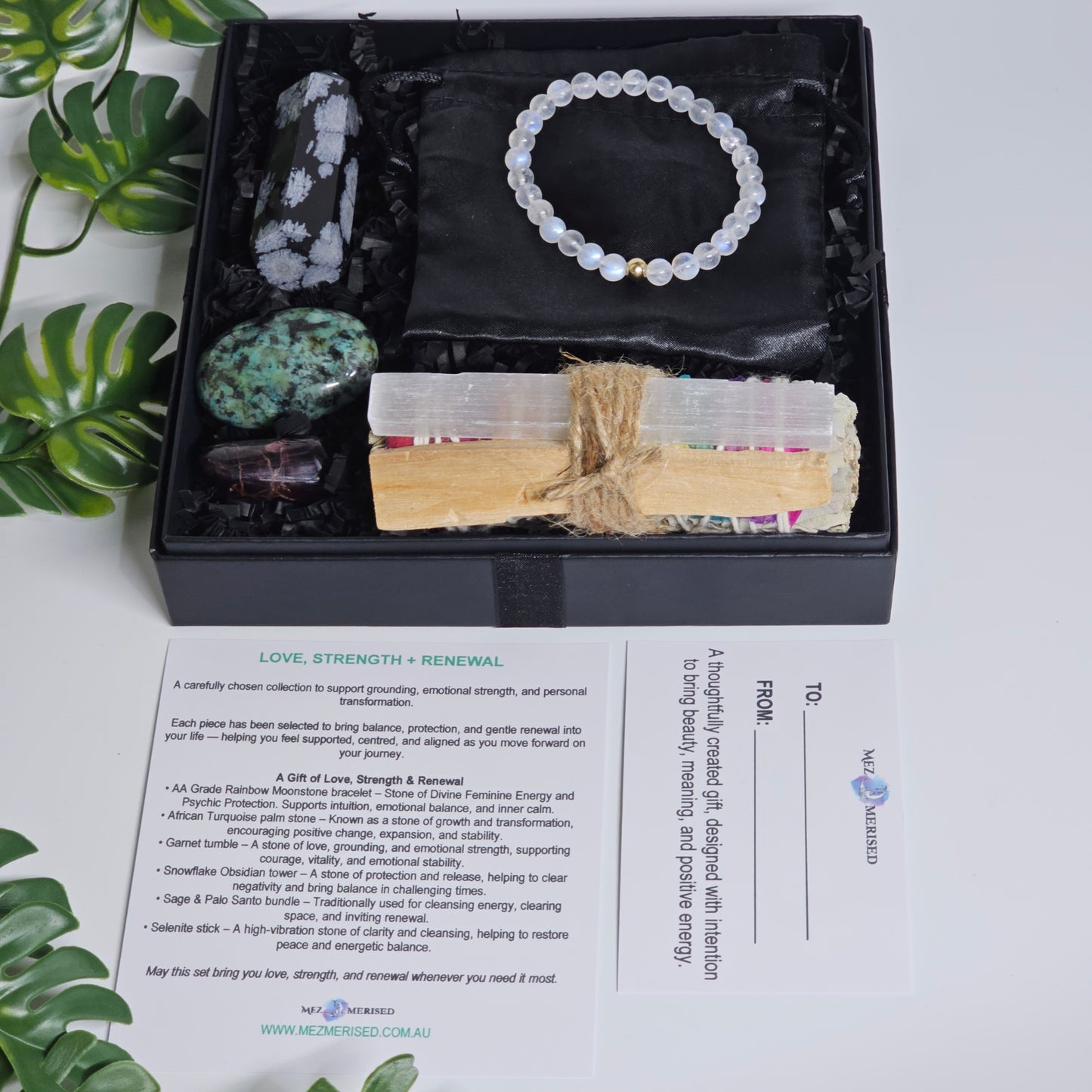 Open crystal gift box showing all items neatly arranged inside.