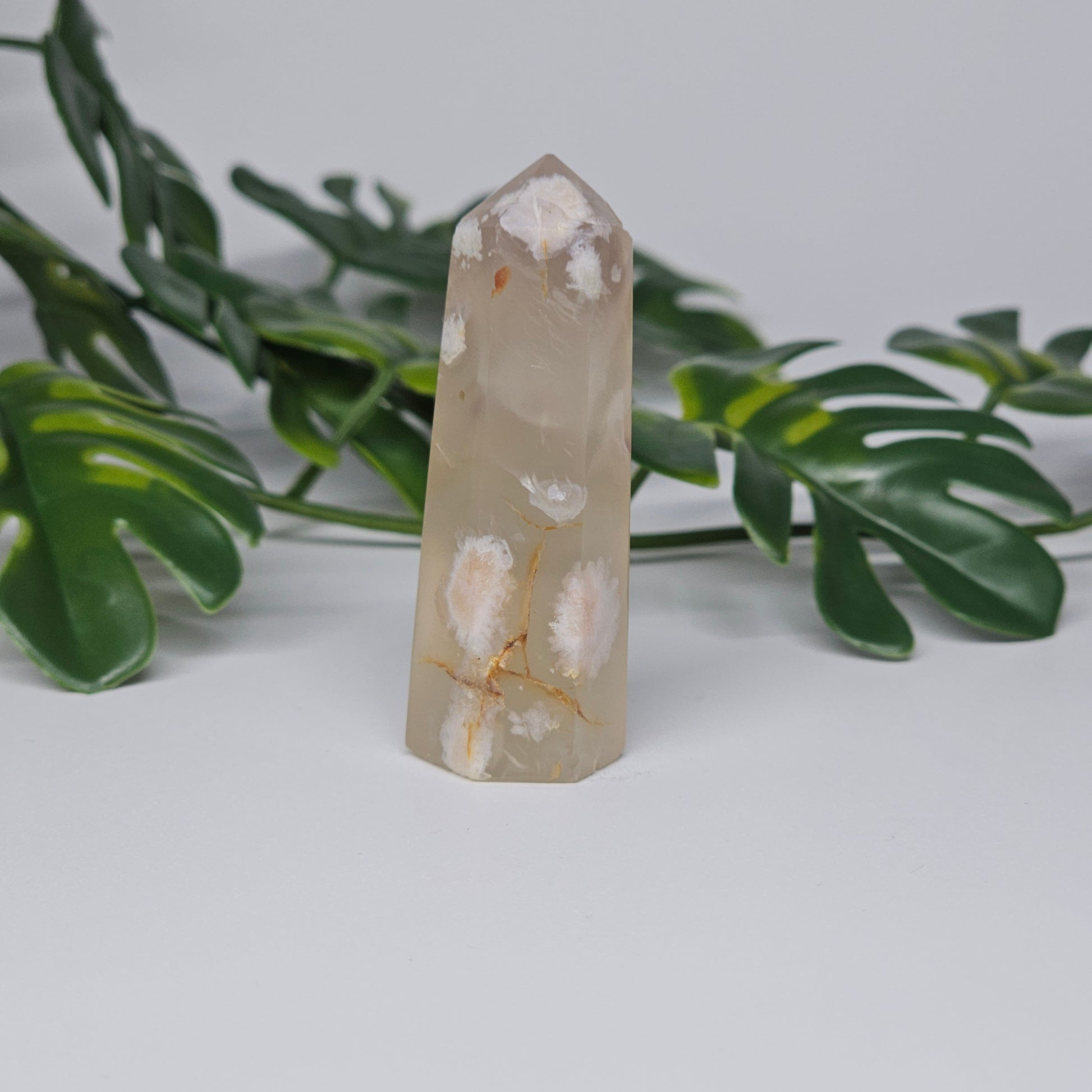 Flower Agate tower showing soft beige tones and natural floral patterns.