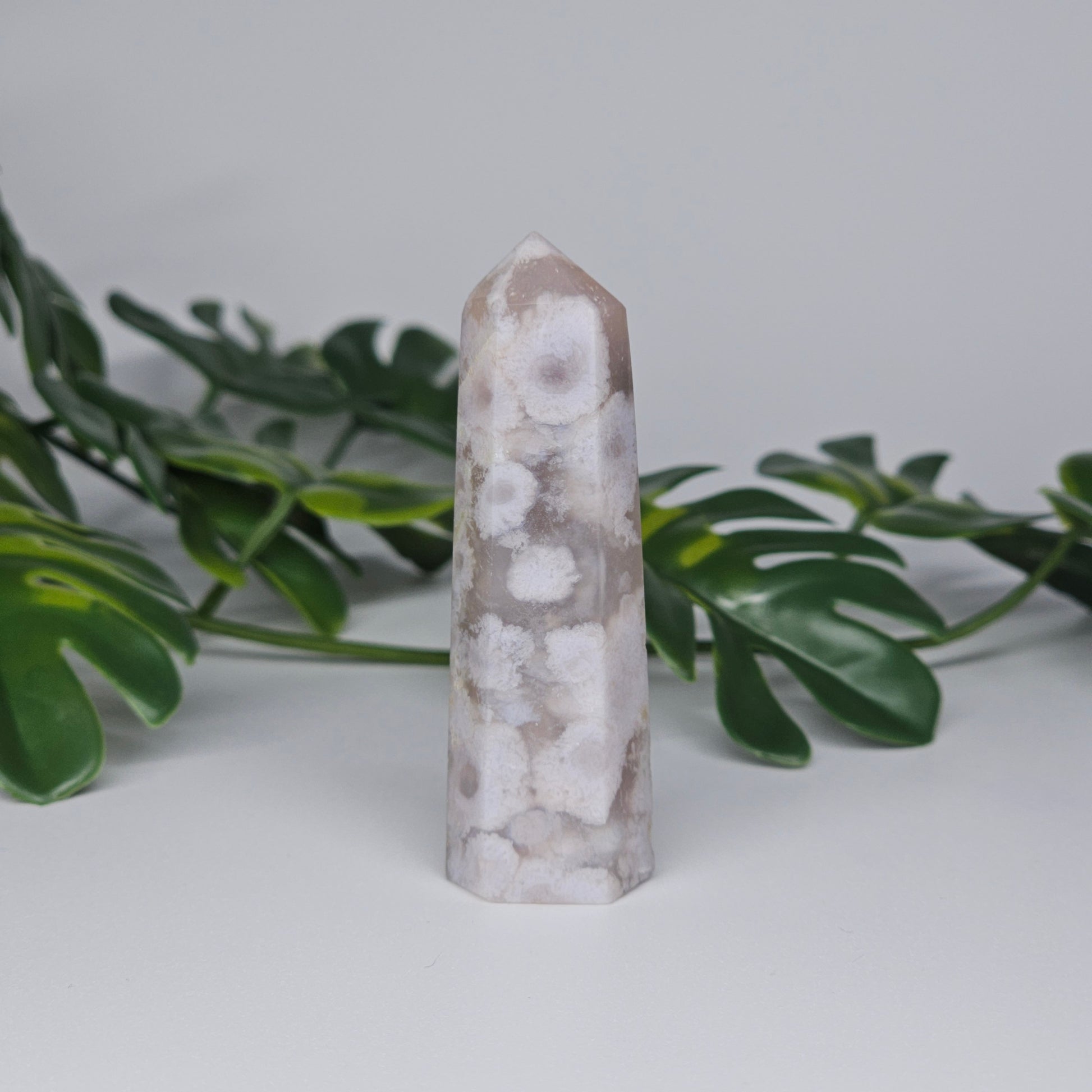 Flower Agate tower showing soft beige tones and natural floral patterns.
