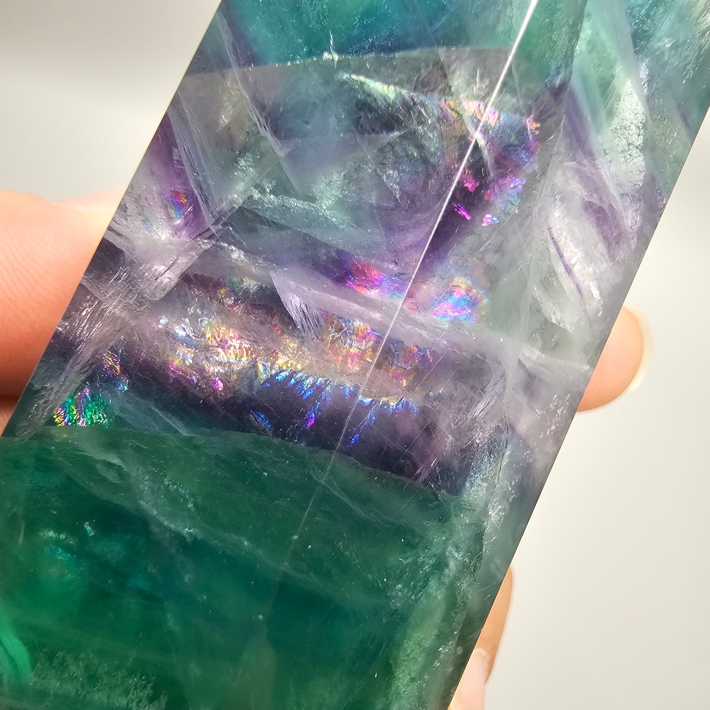 Fluorite crystal tower with big rainbows