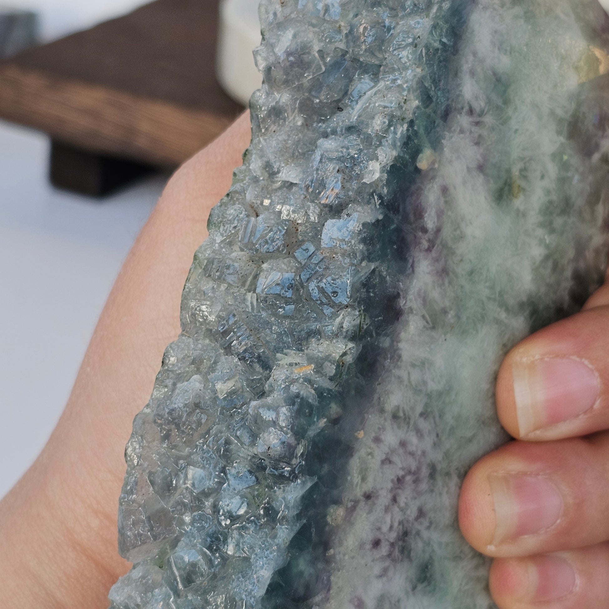 Close up of Fluorite druzy edge showing fine crystal sparkle.