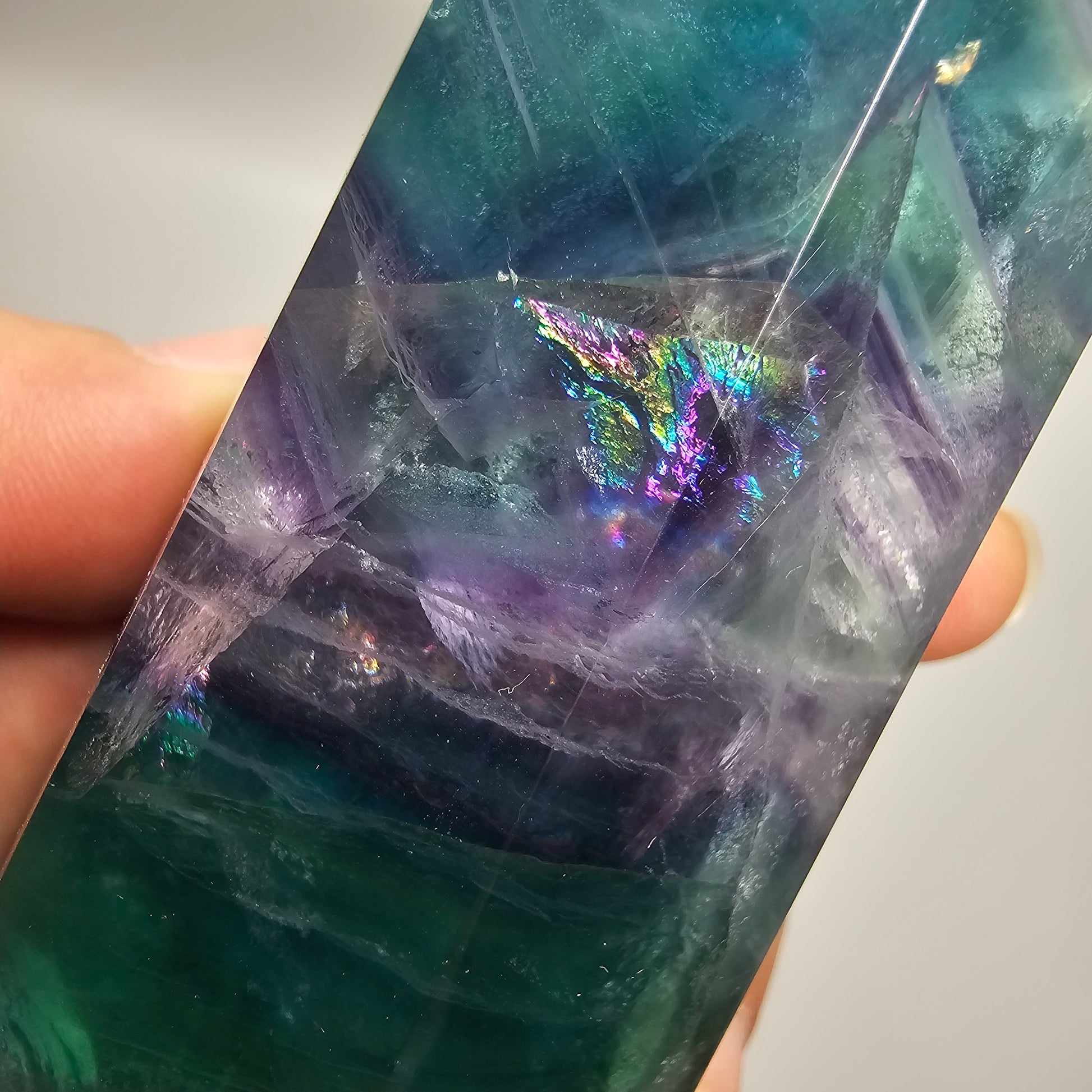 Fluorite crystal tower with big rainbows
