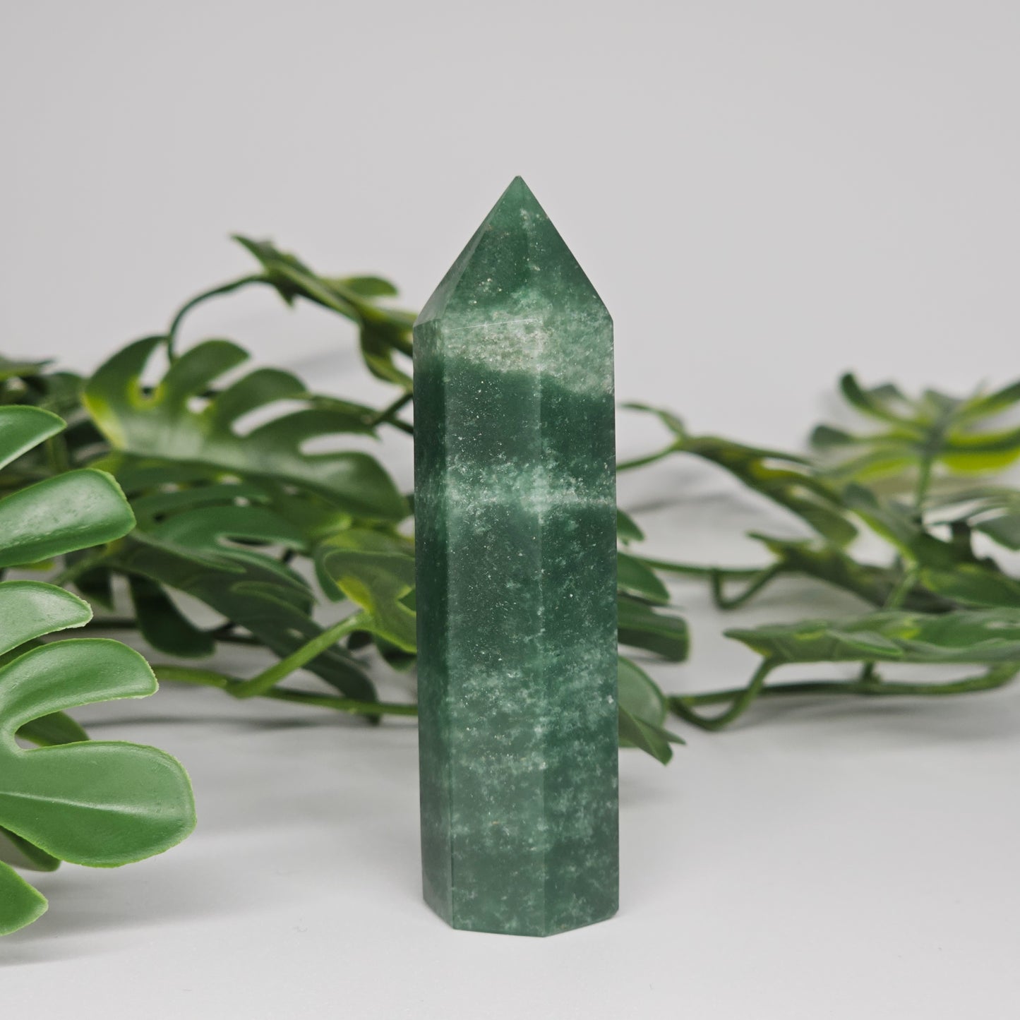 Green aventurine crystal tower polished point with natural green colour and soft shimmer