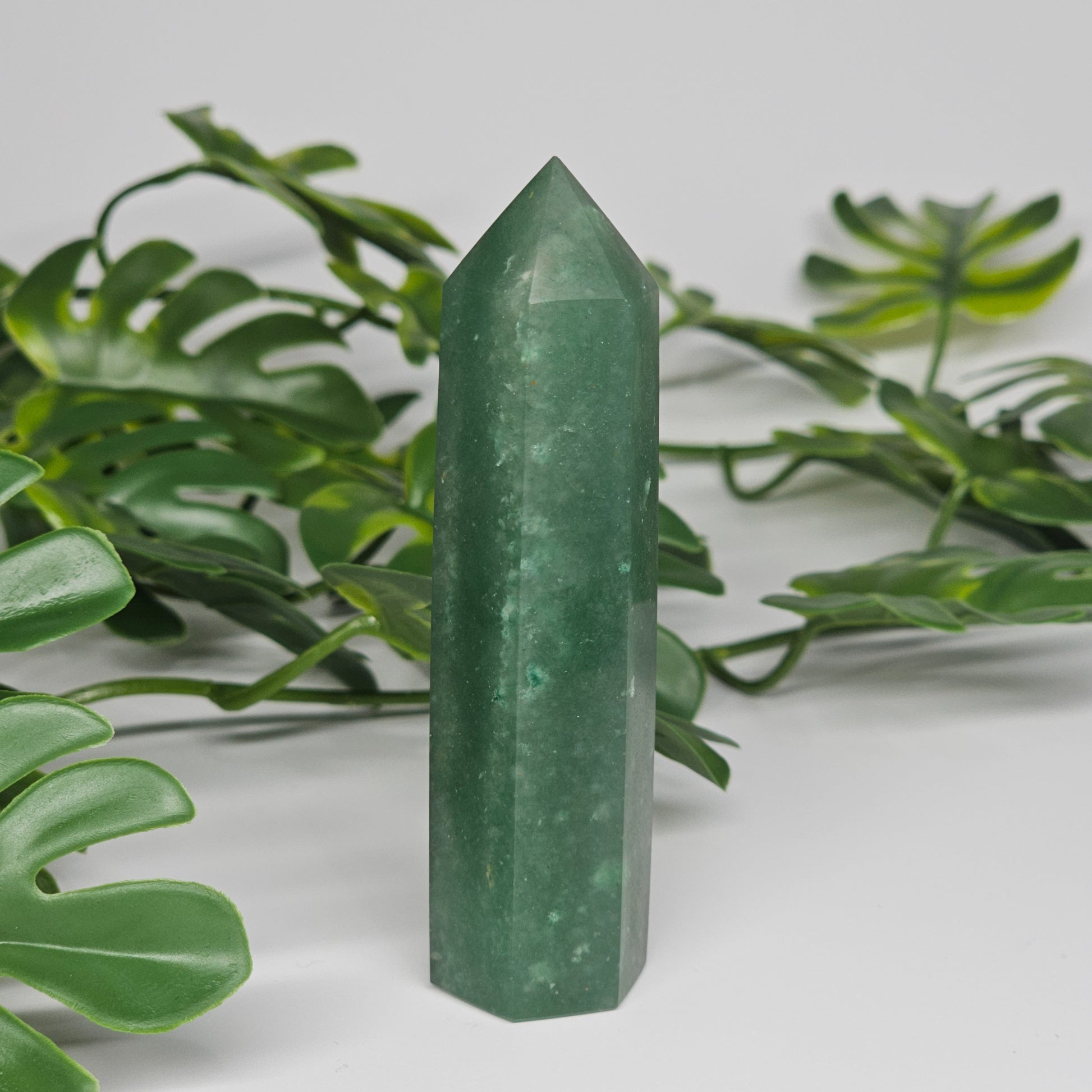 Green aventurine crystal tower polished point with natural green colour and soft shimmer