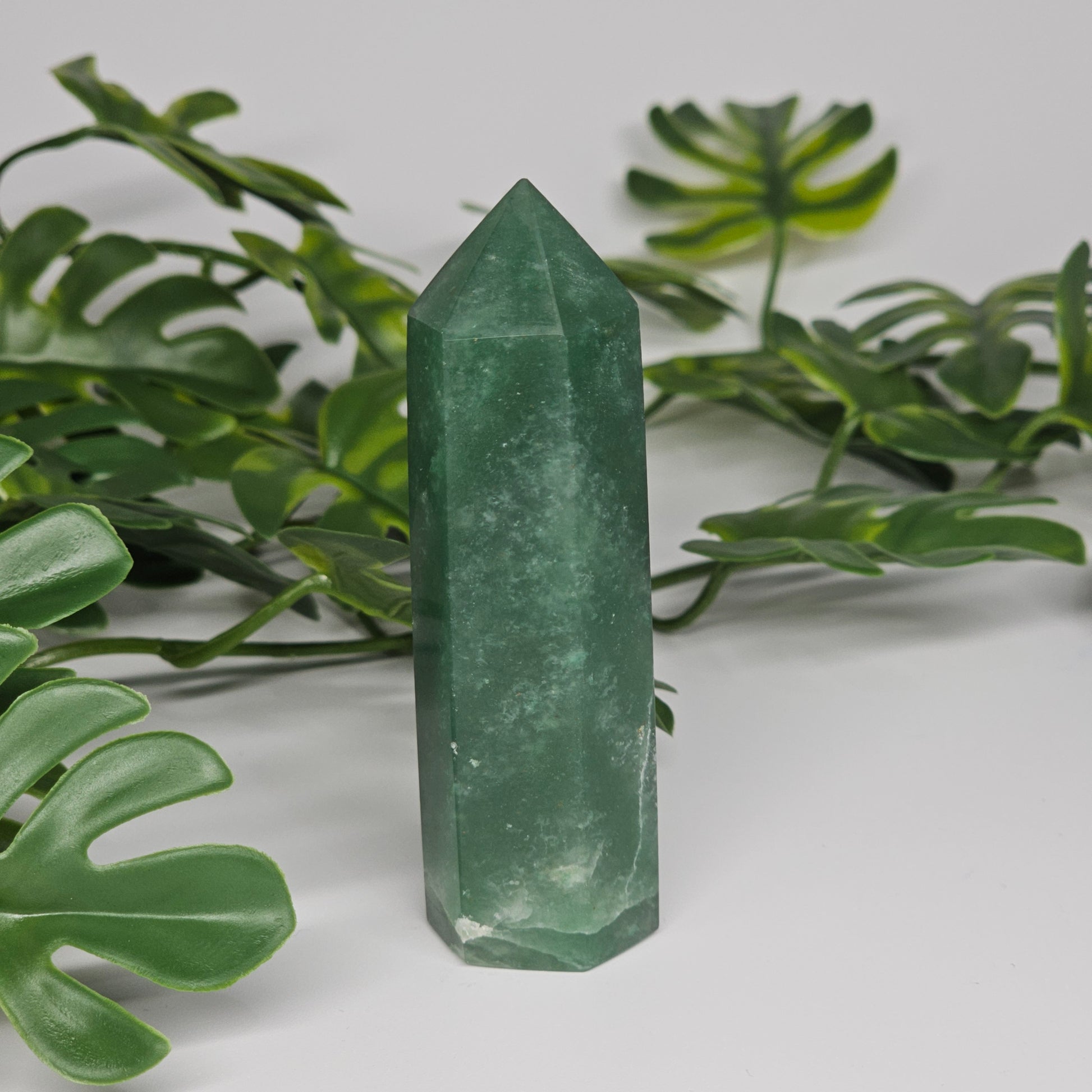 Green aventurine crystal tower polished point with natural green colour and soft shimmer