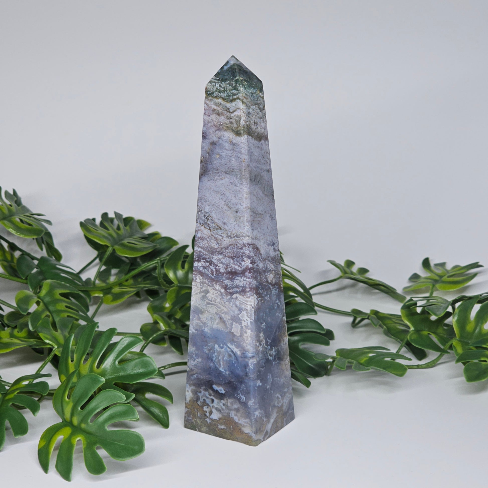 Moss agate and blue chalcedony healing crystal obelisk with green and blue tones