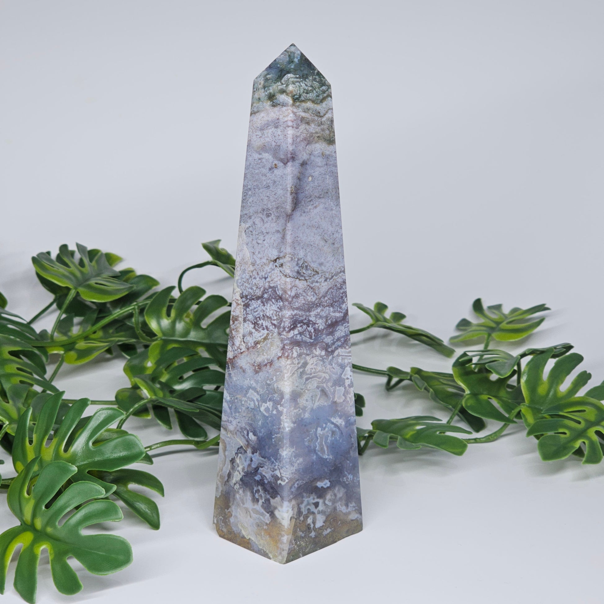 Moss agate and blue chalcedony healing crystal obelisk with green and blue tones