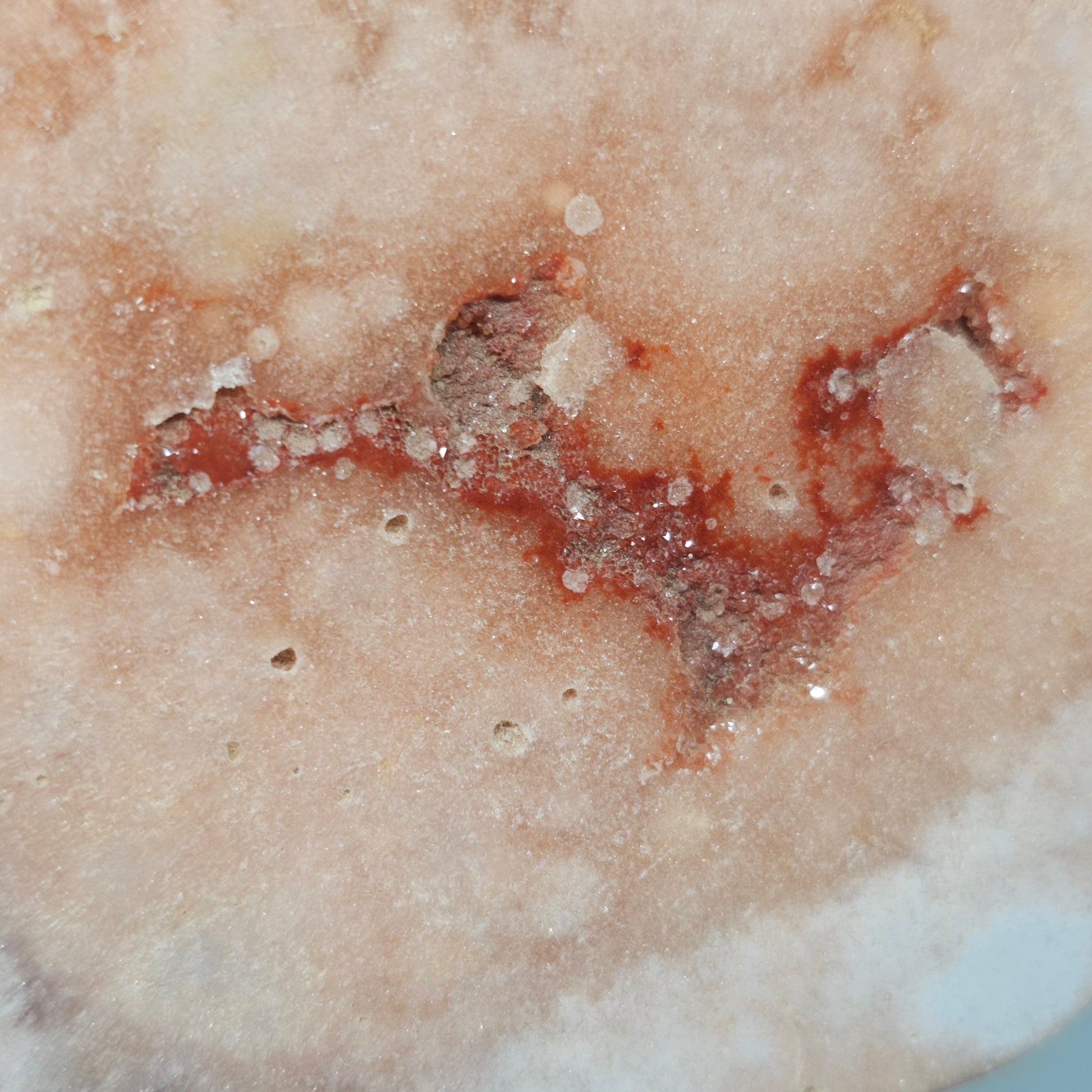 A detailed shot of the front surface featuring sparkling sugar druzy.