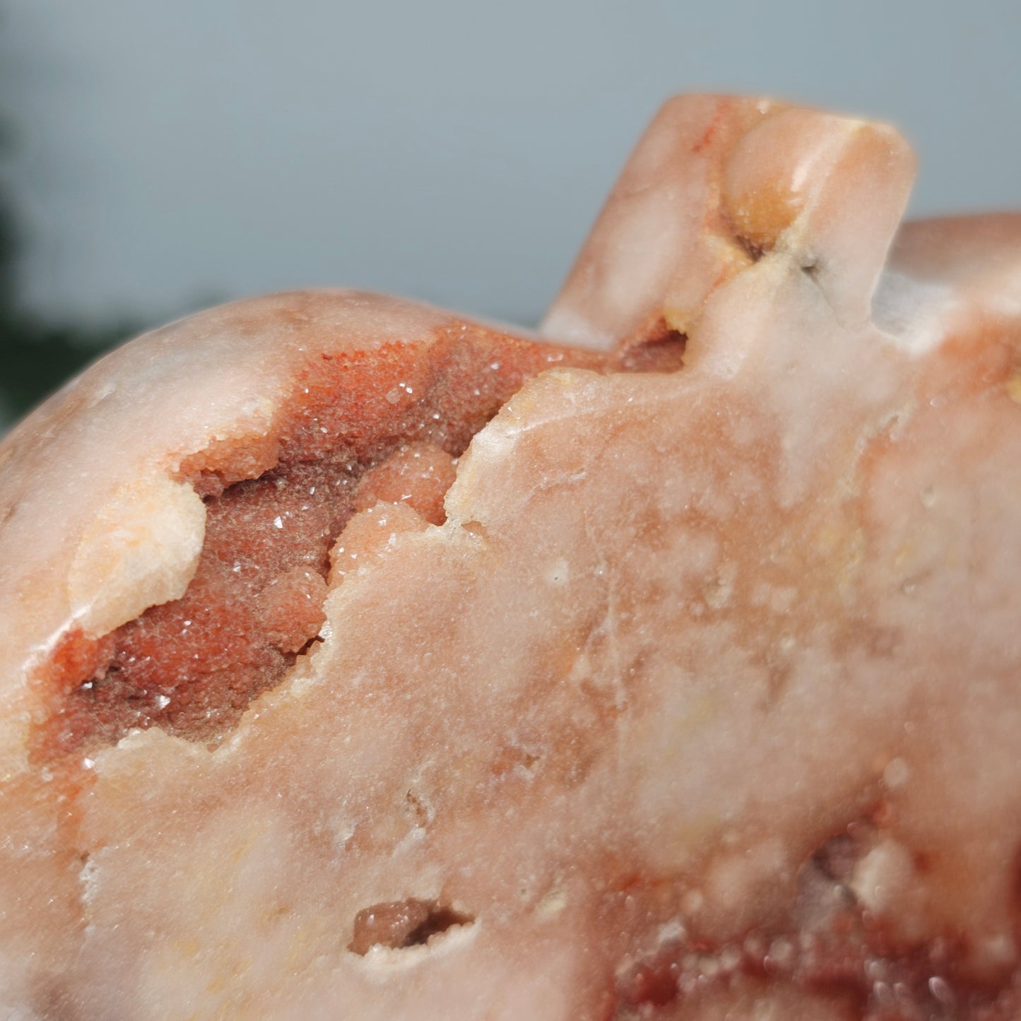A close-up of the front face highlighting the intricate botryoidal textures and deep pink mineral saturation.
