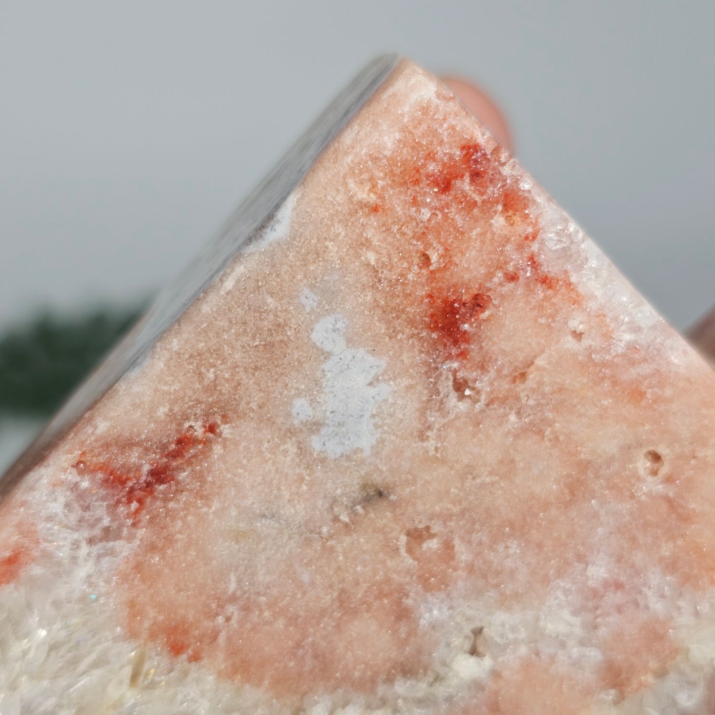 A detailed shot highlighting the rare, deep red tones and saturated mineral pockets that define this unique Brazilian specimen.