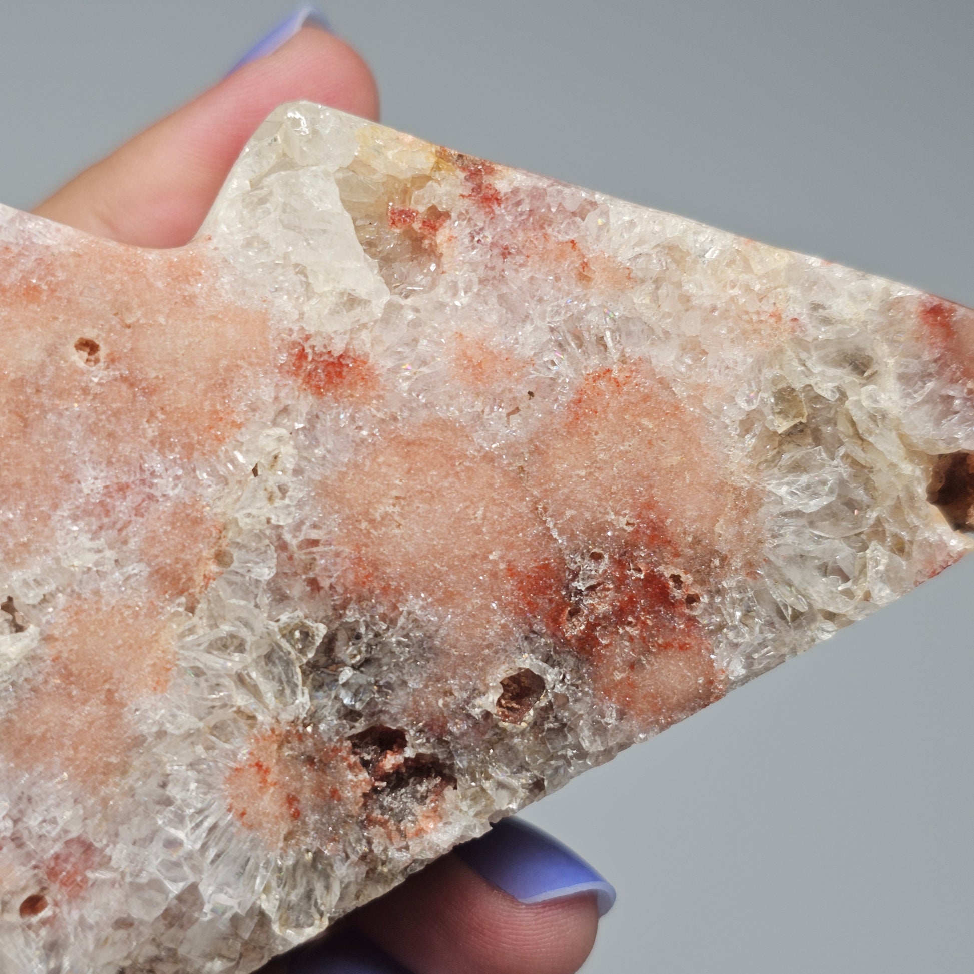 A close-up view of the front face showcasing the quartz that sparkles like snow across the mountain peaks.
