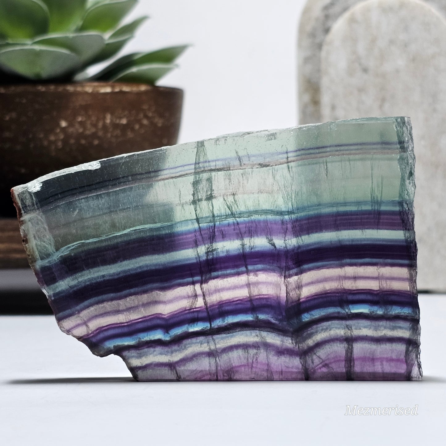 Large Fluorite slab piece standing showing natural shape and colour.