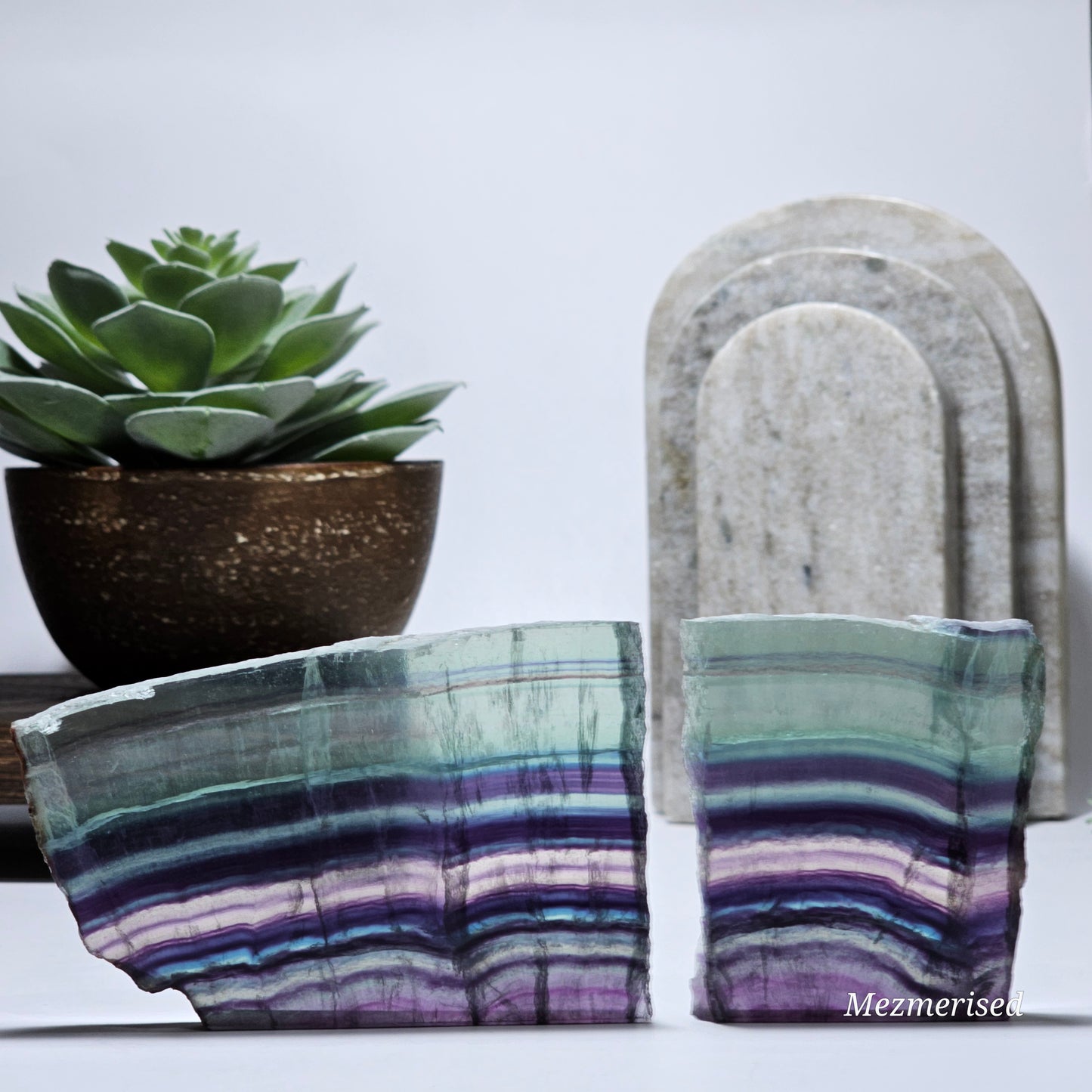 Both Fluorite slab pieces standing with visible separation.