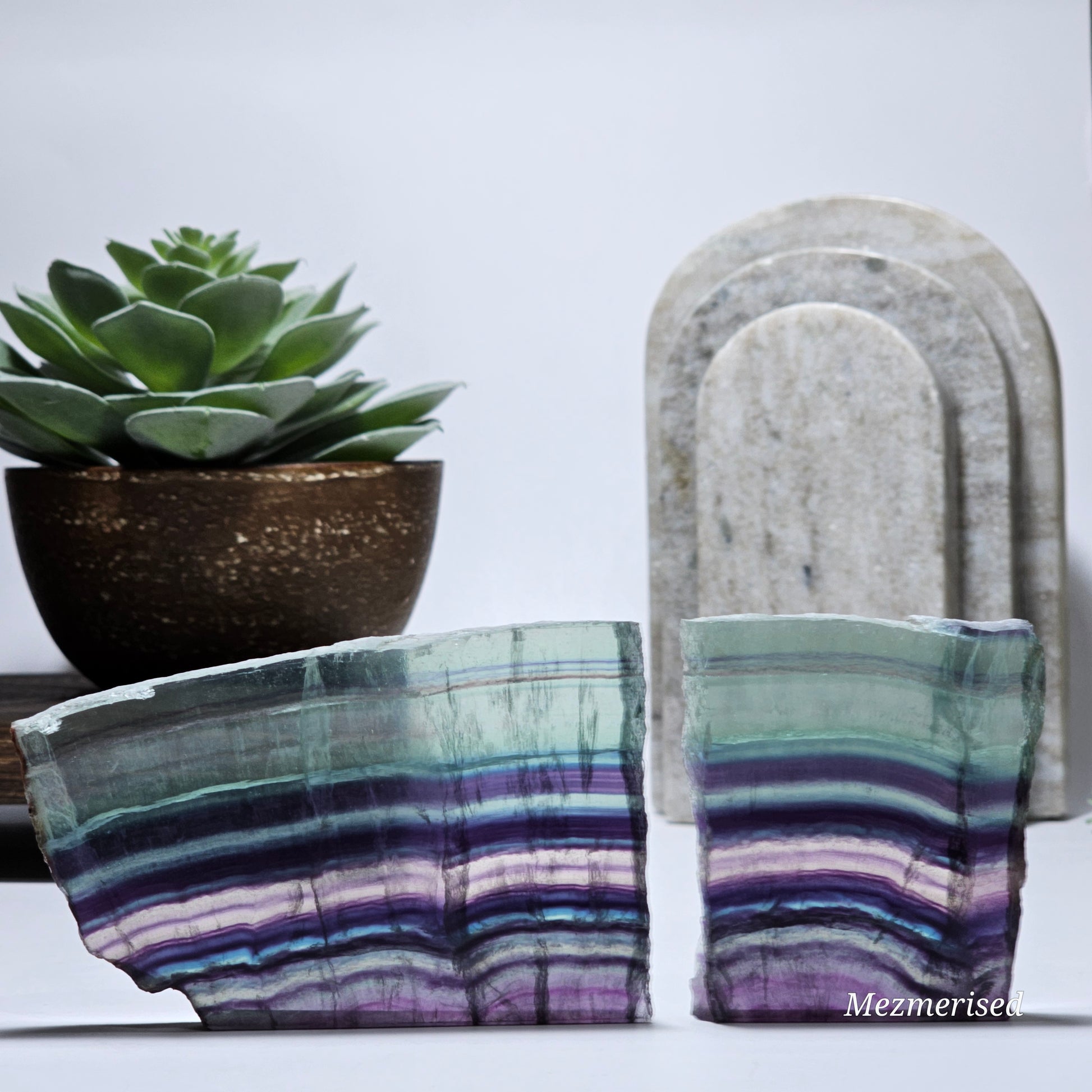 Both Fluorite slab pieces standing with visible separation.
