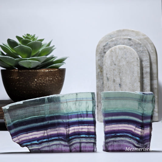 Both Fluorite slab pieces standing with visible separation.