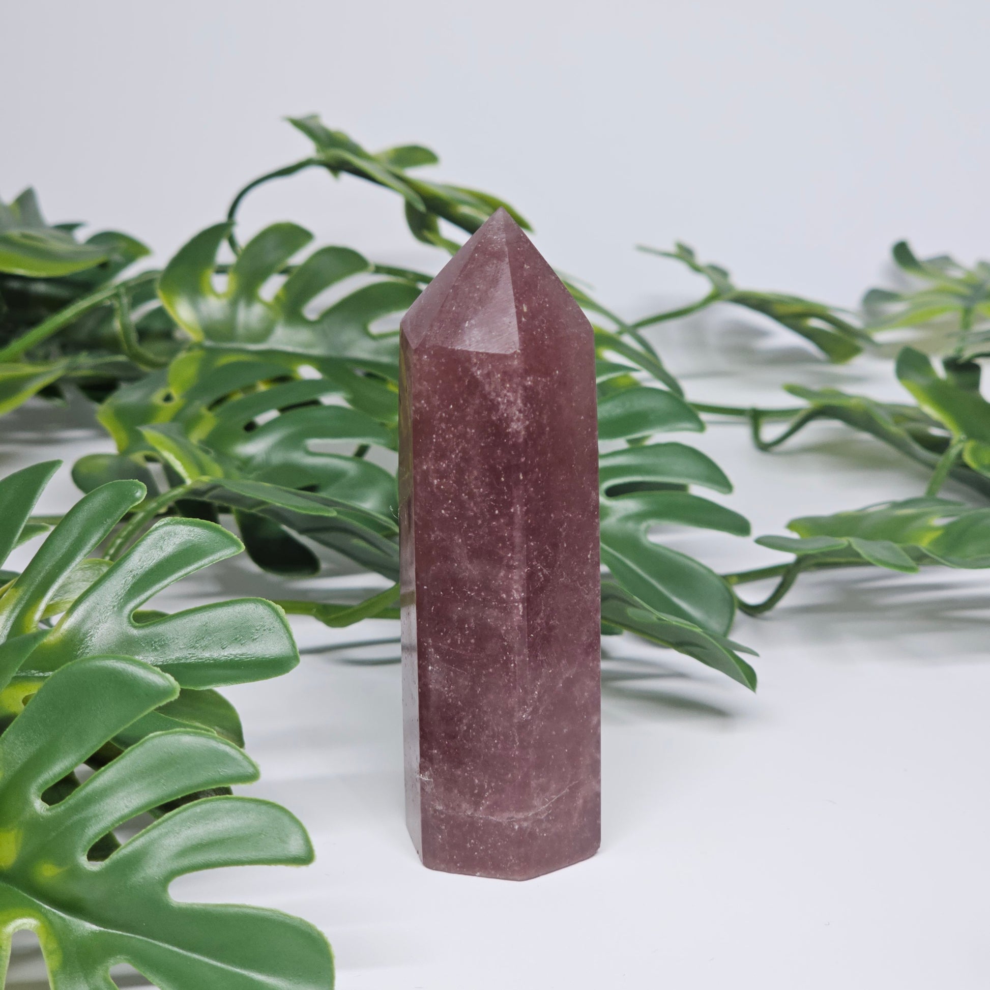 Red Aventurine crystal tower for love and positivity displayed as home decor