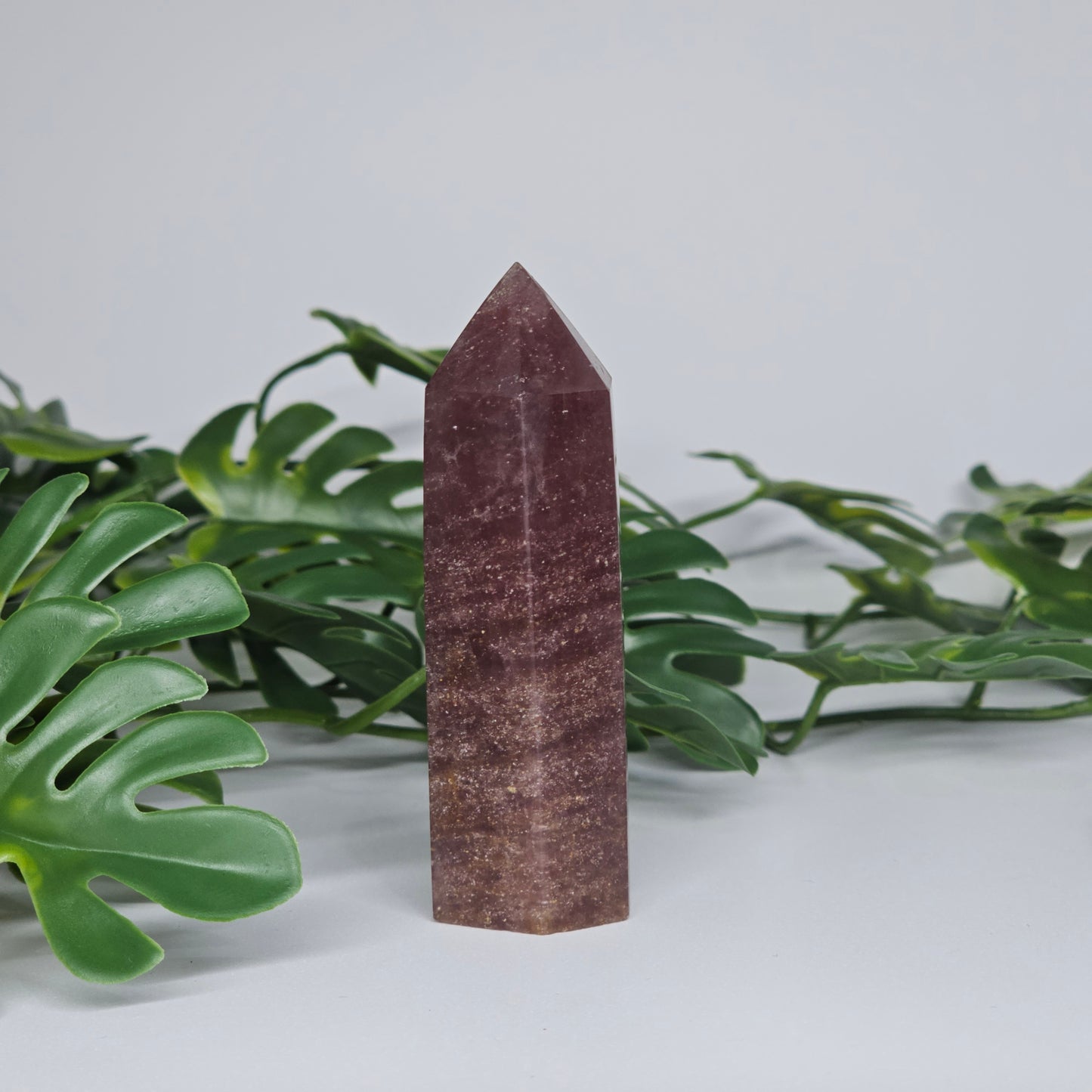 Red Aventurine crystal tower for love and positivity displayed as home decor