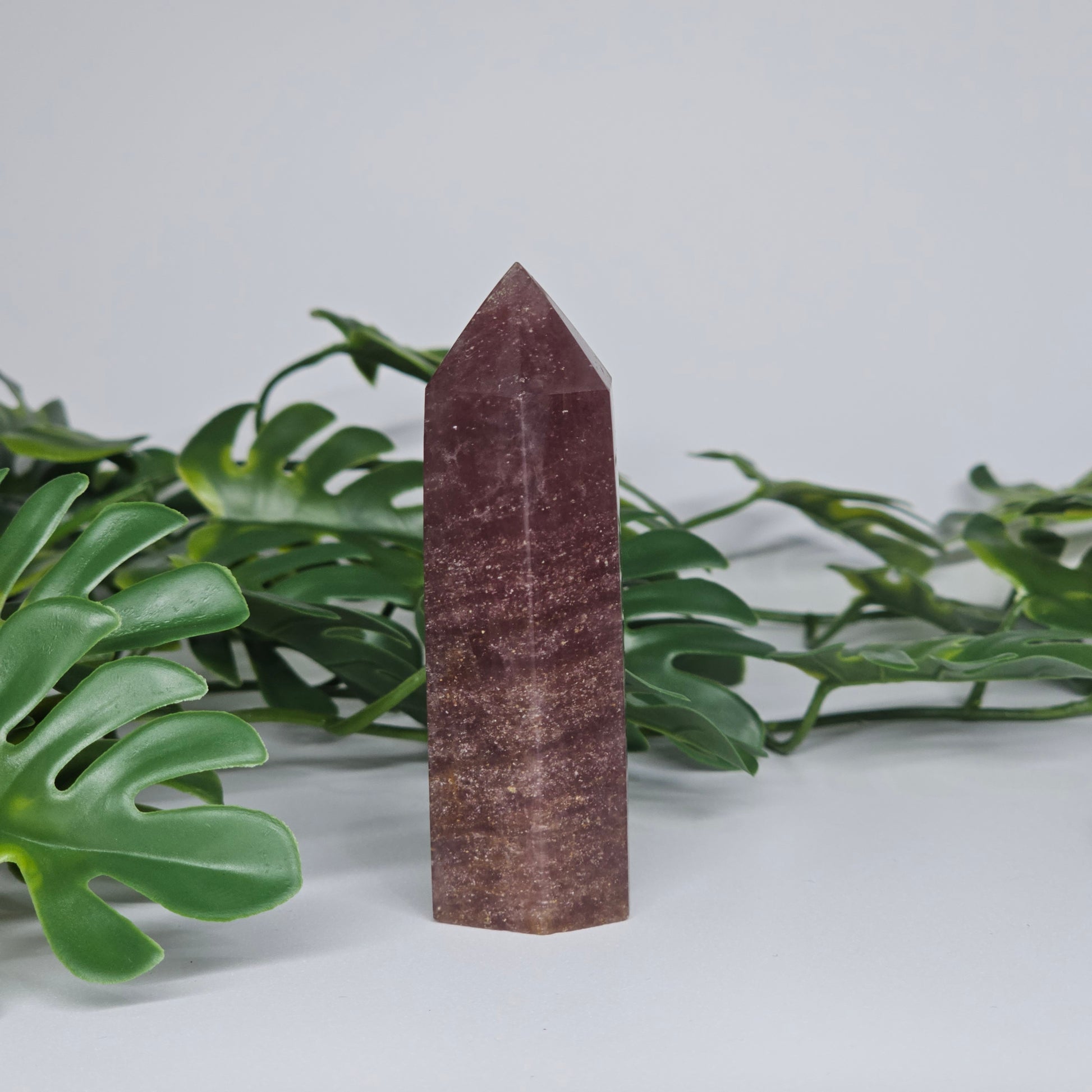 Red Aventurine crystal tower for love and positivity displayed as home decor