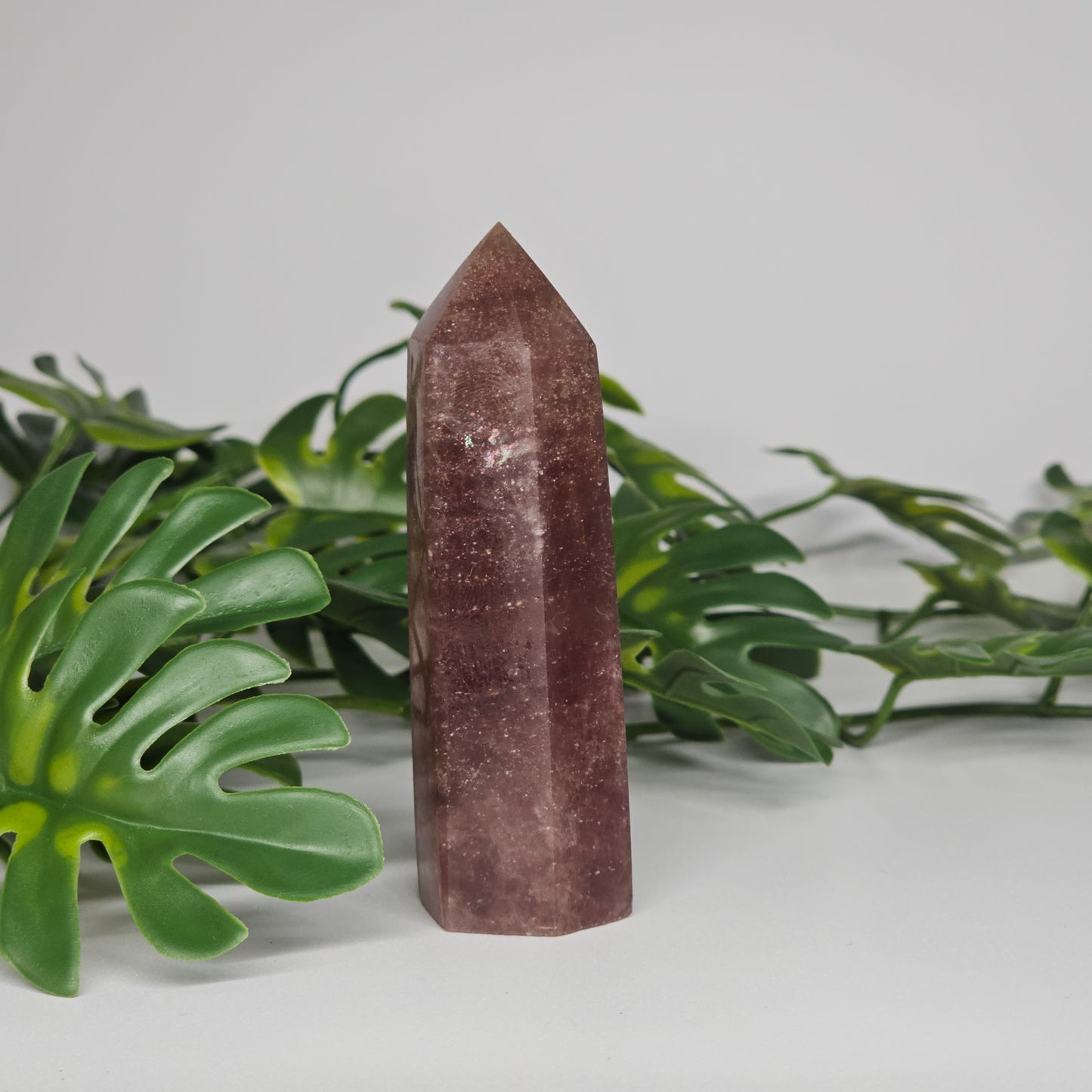 Red Aventurine crystal tower for love and positivity displayed as home decor