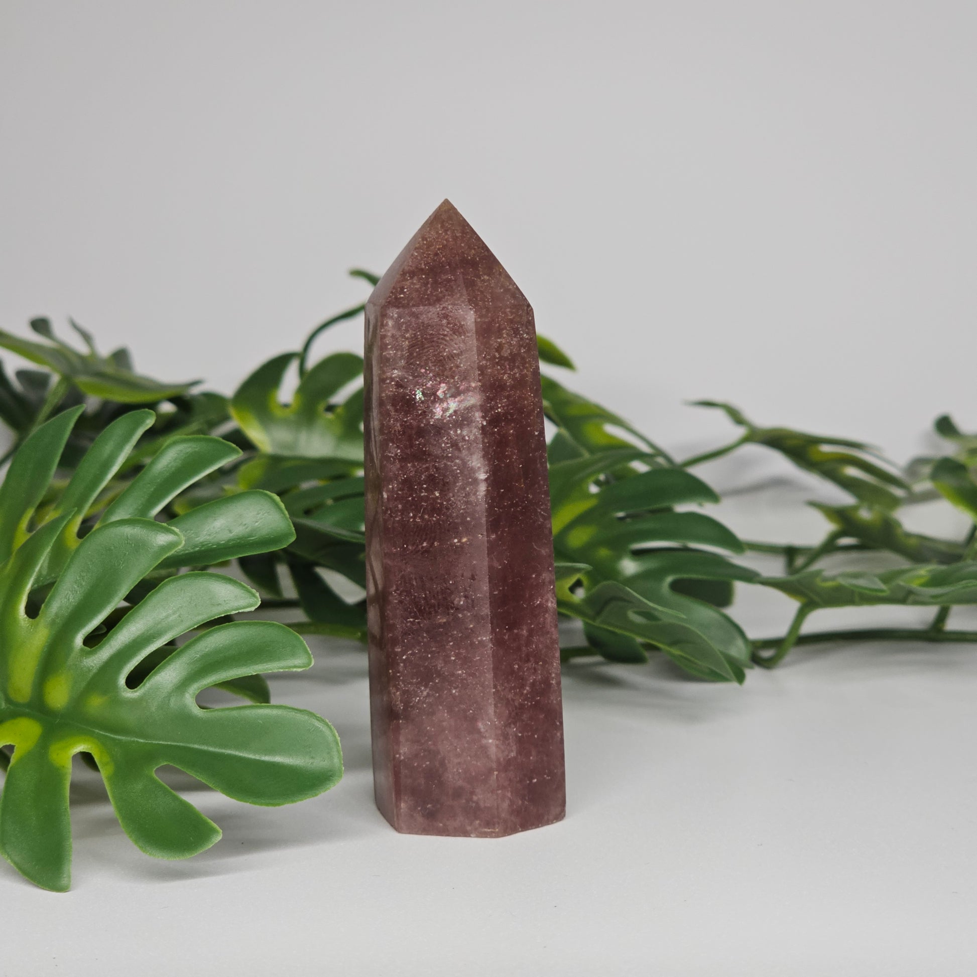 Red Aventurine crystal tower for love and positivity displayed as home decor