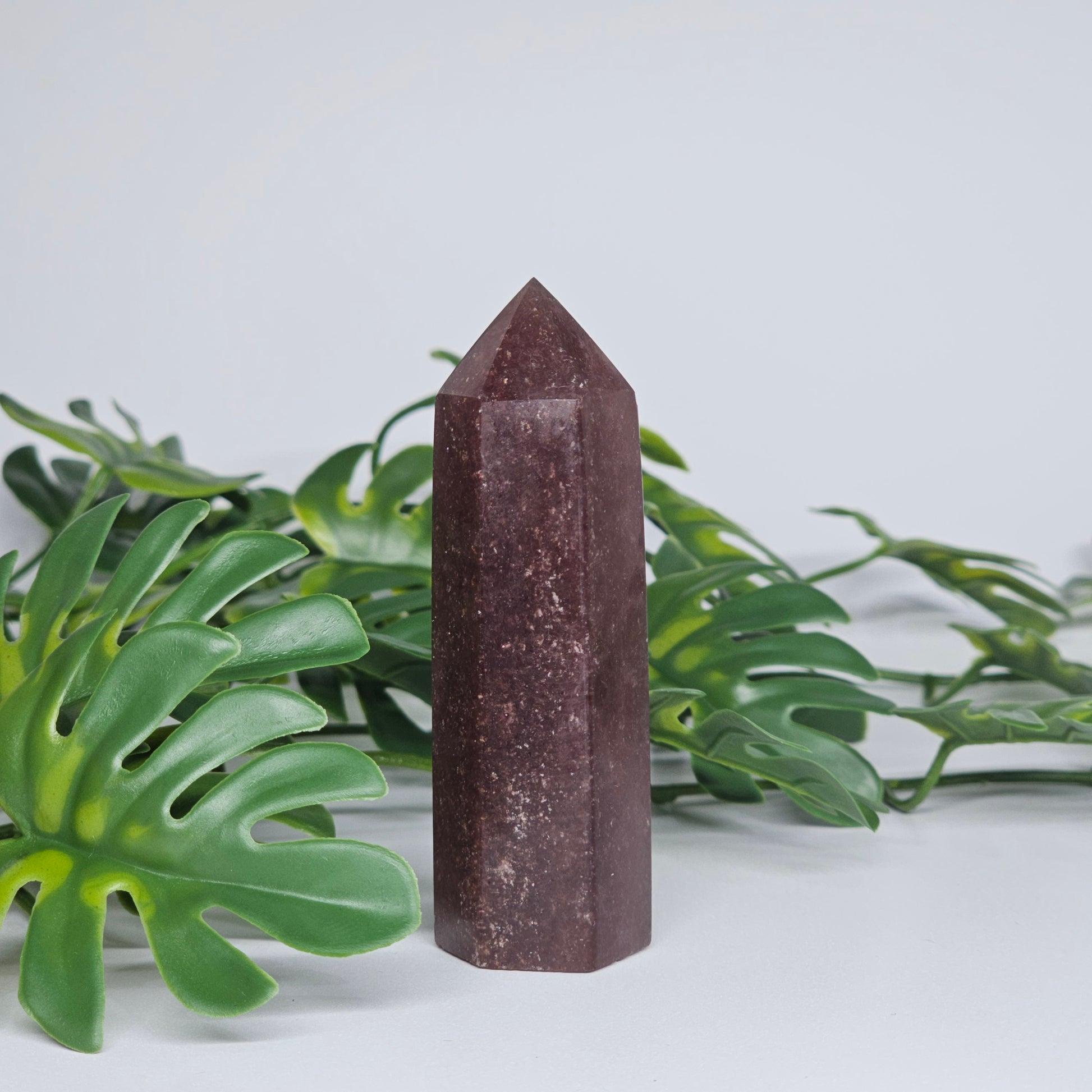 Red Aventurine crystal tower for love and positivity displayed as home decor
