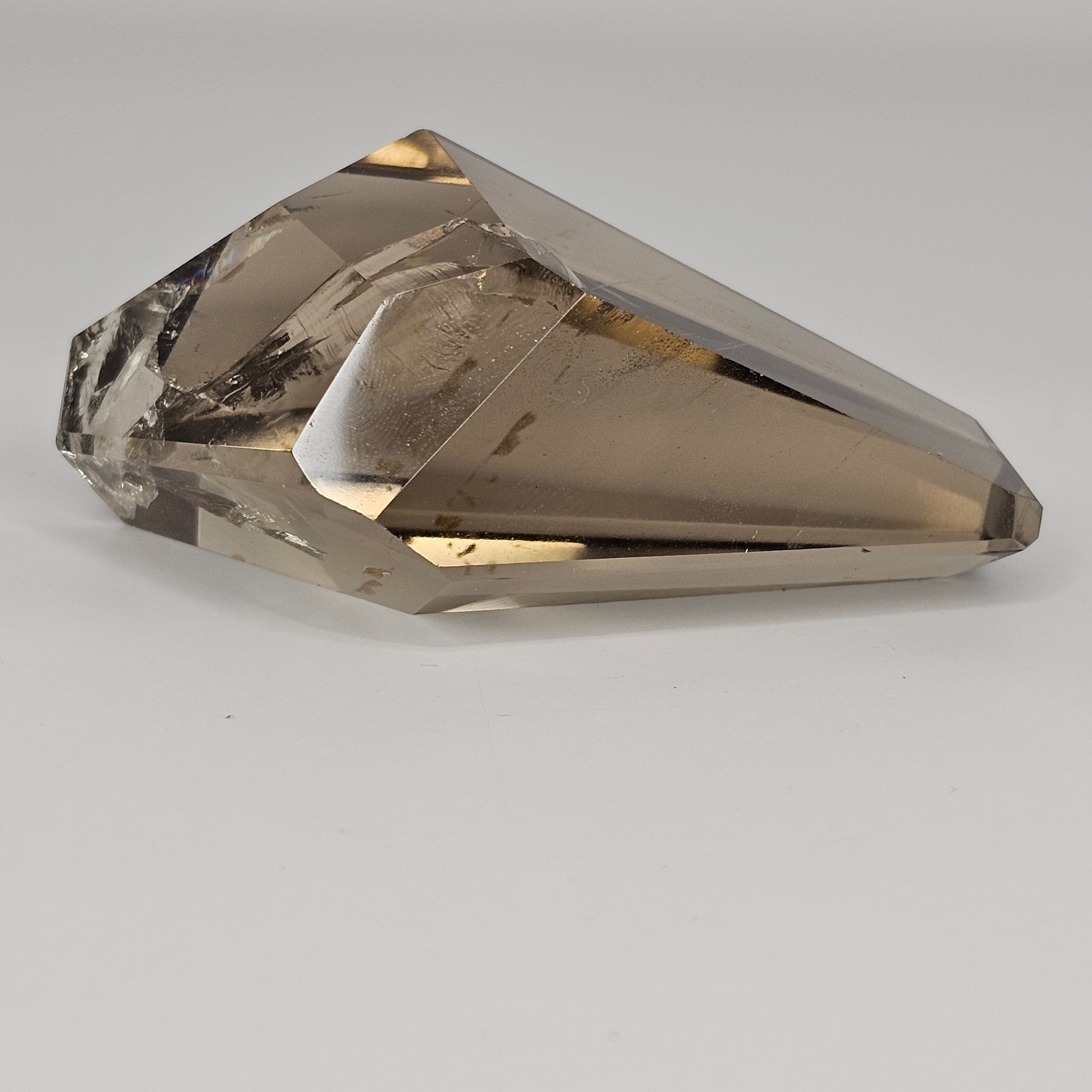 Front view of the Smoky Citrine freeform showcasing its exceptional clarity and transparency, with warm smoky and golden tones visible through the polished surface.