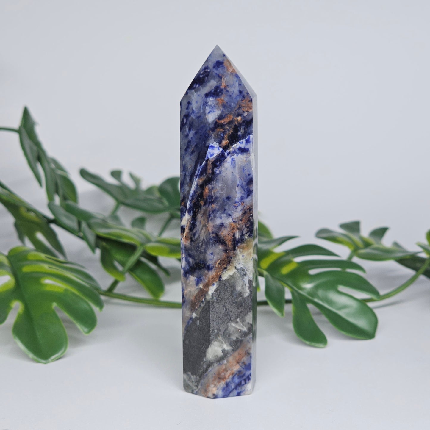Sodalite tower showing deep blue colour with natural white veining.