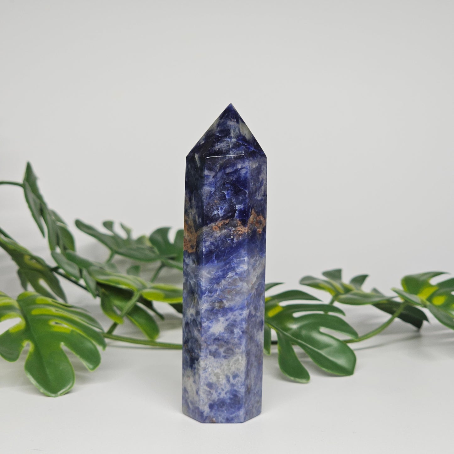 Sodalite tower showing deep blue colour with natural white veining.