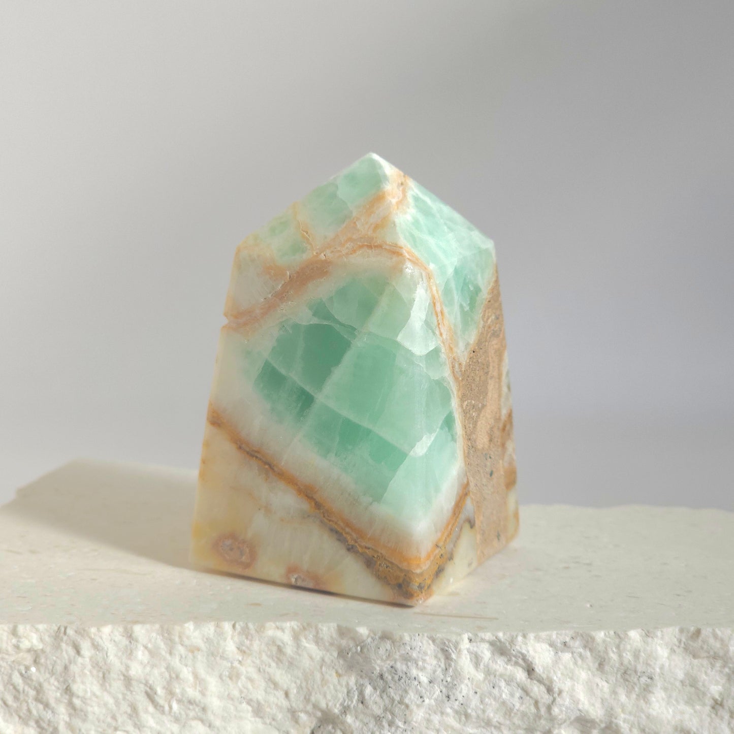 Caribbean Calcite Tower Natural Ocean Beauty with Soft Green Coastal Patterns
