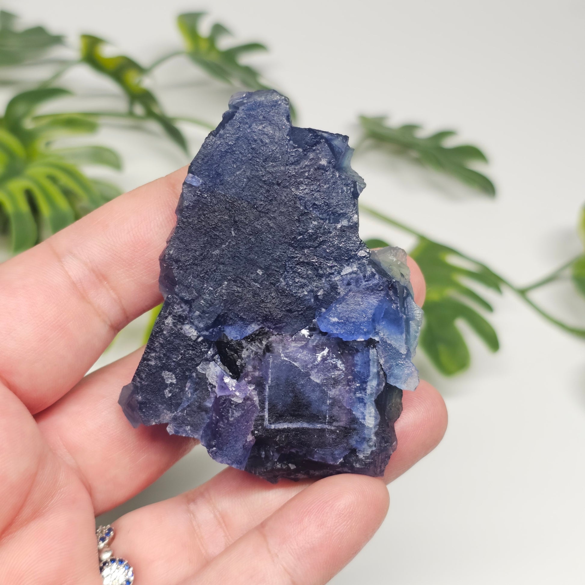 Rear and underside view of the Blue Fluorite cluster showing natural matrix and crystal growth patterns.