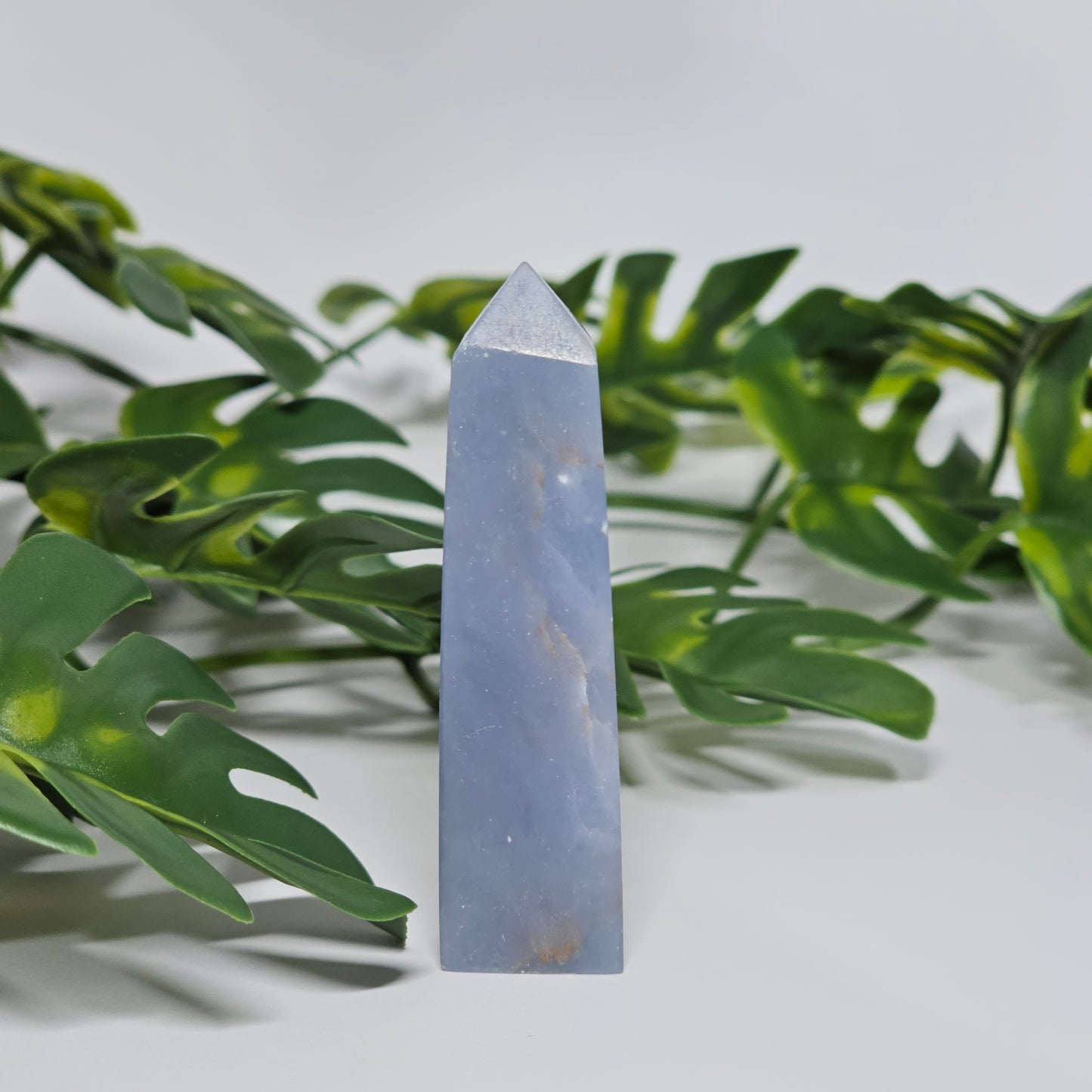 Angelite point crystal for meditation decor