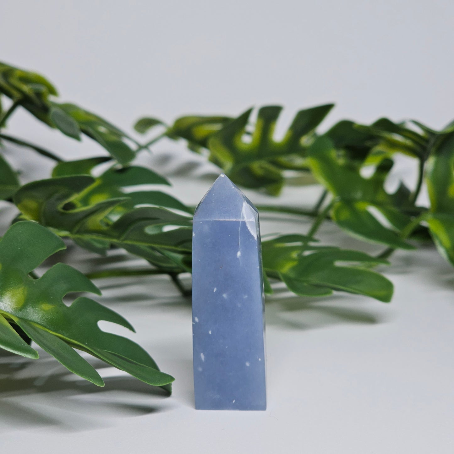 Angelite point crystal for meditation decor