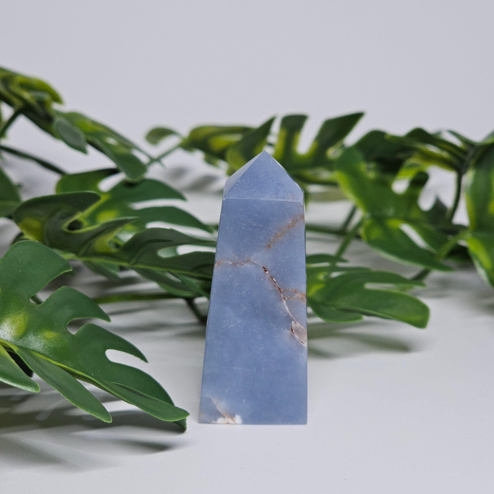Angelite point crystal for meditation decor