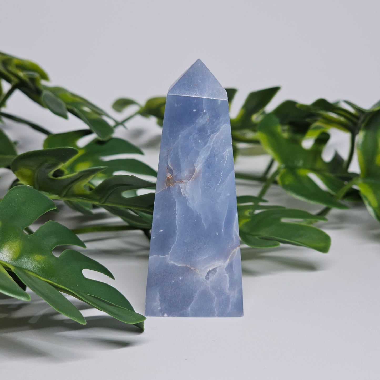 Angelite point crystal for meditation decor