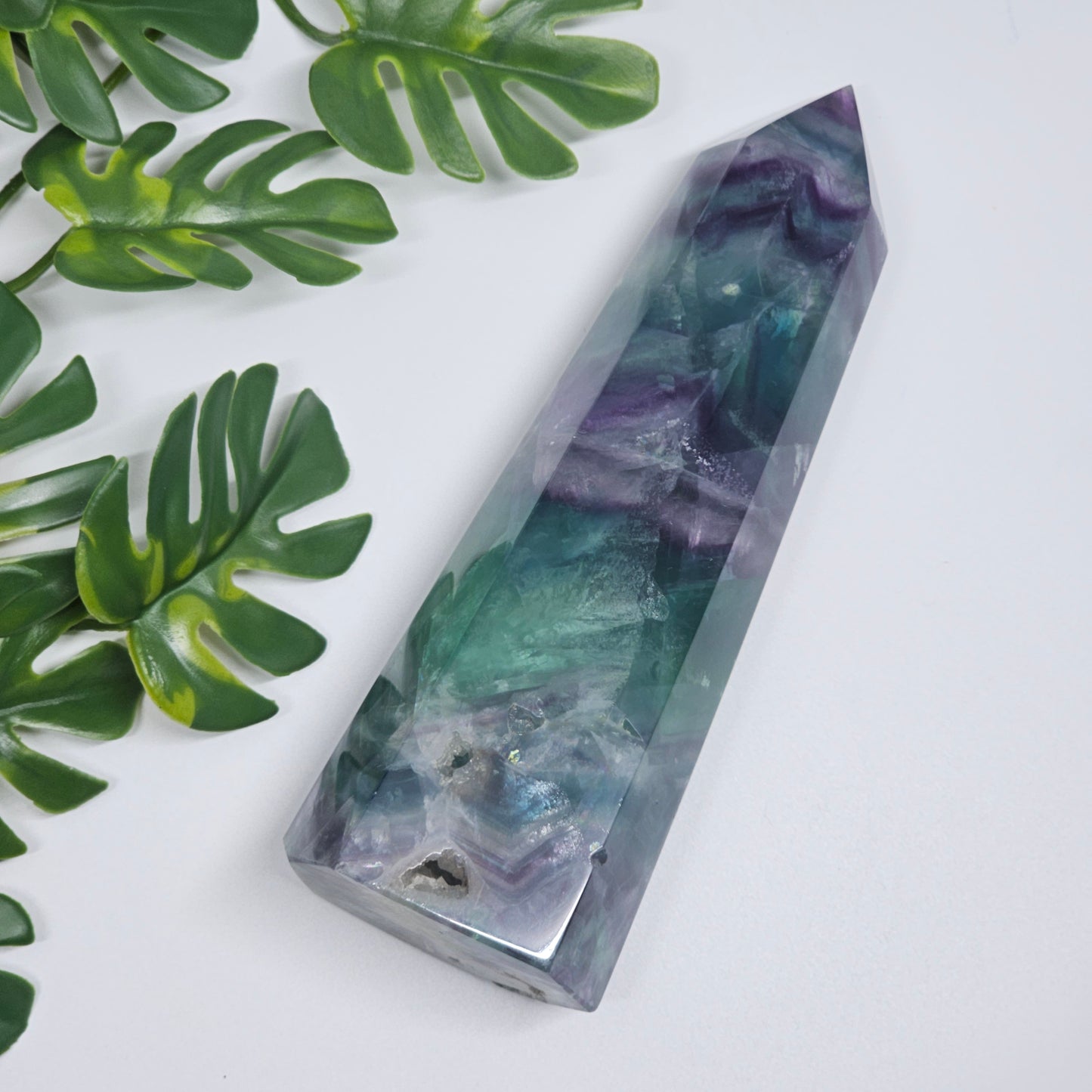 Large polished fluorite tower crystal with green, blue, purple and clear natural banding
