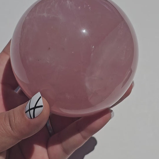 A stunning dark Rose Quartz sphere with beautiful asterism