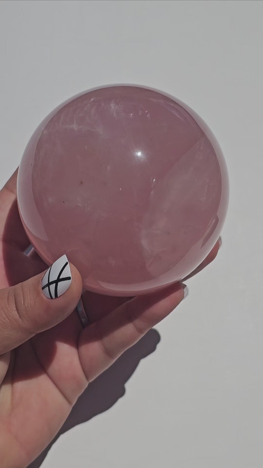 A stunning dark Rose Quartz sphere with beautiful asterism