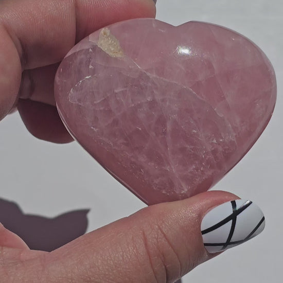 Beautifully carved puffy Rose Quartz hearts.