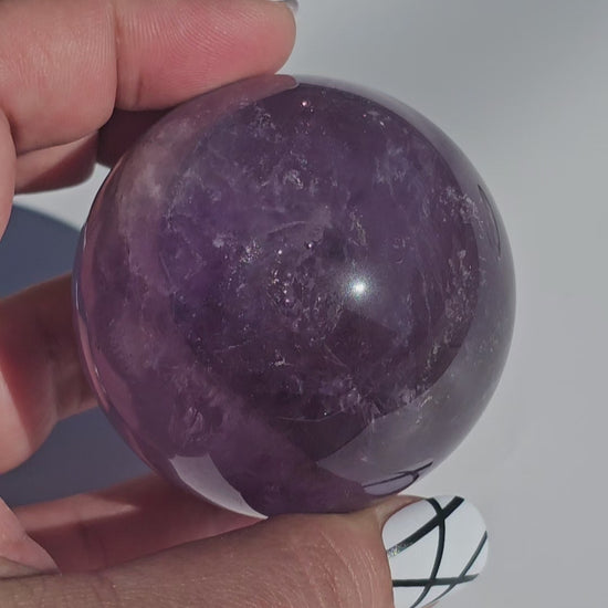 A calming rich purple Amethyst sphere.