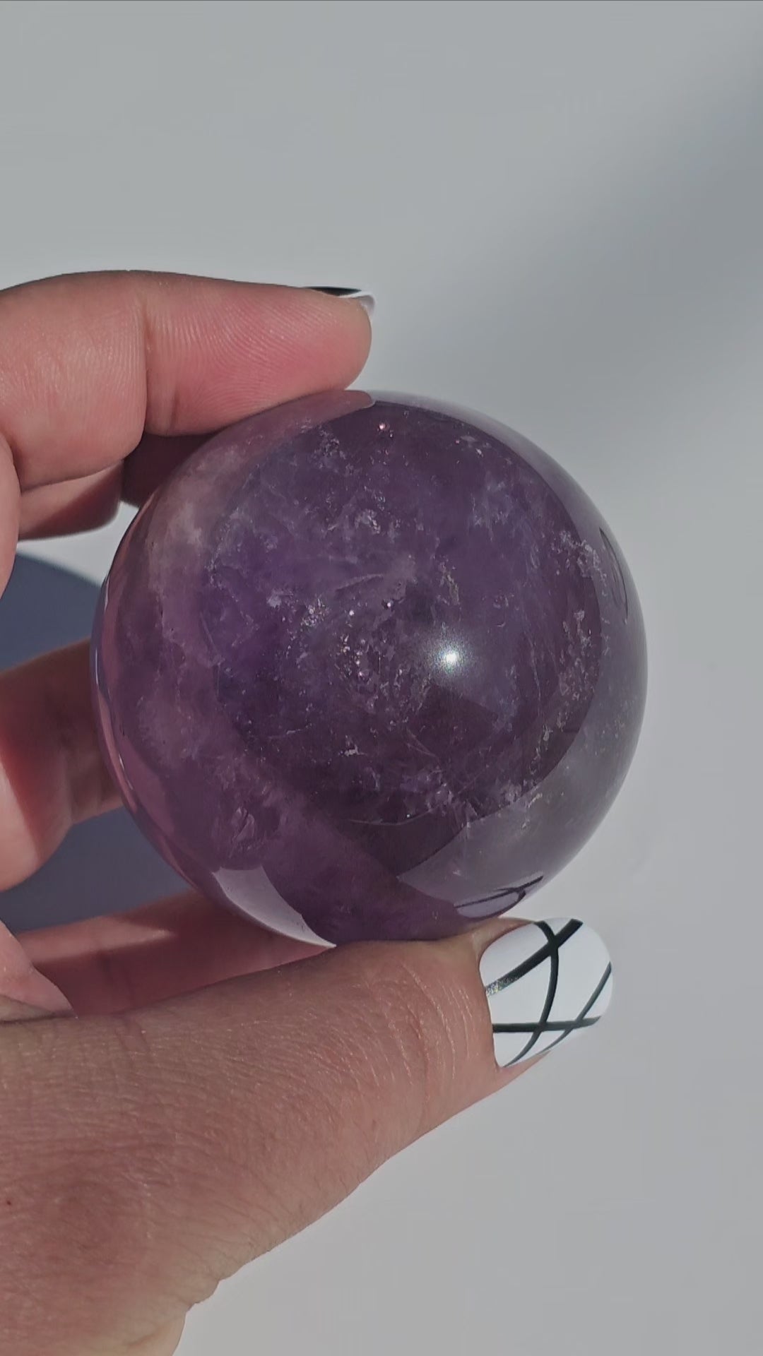 A calming rich purple Amethyst sphere.