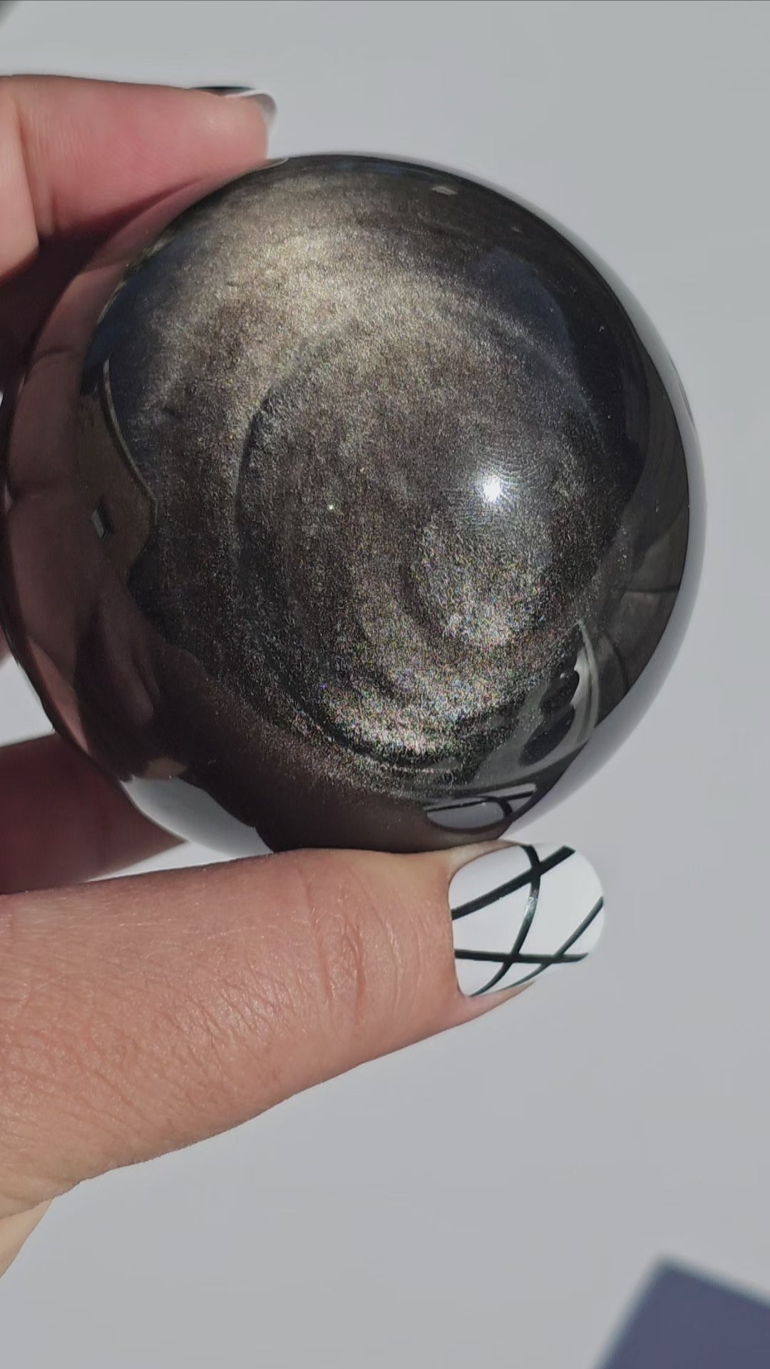 Black Obsidian sphere with an alluring sheen of Silver.