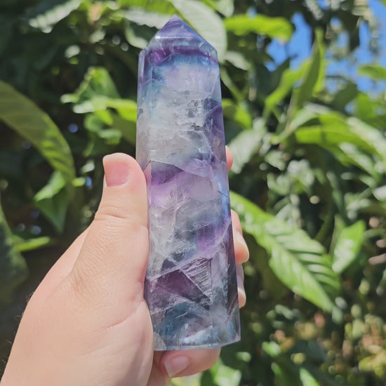 Large Fluorite tower with vibrant blue, purple and green banding, and gorgeous rainbows throughout.